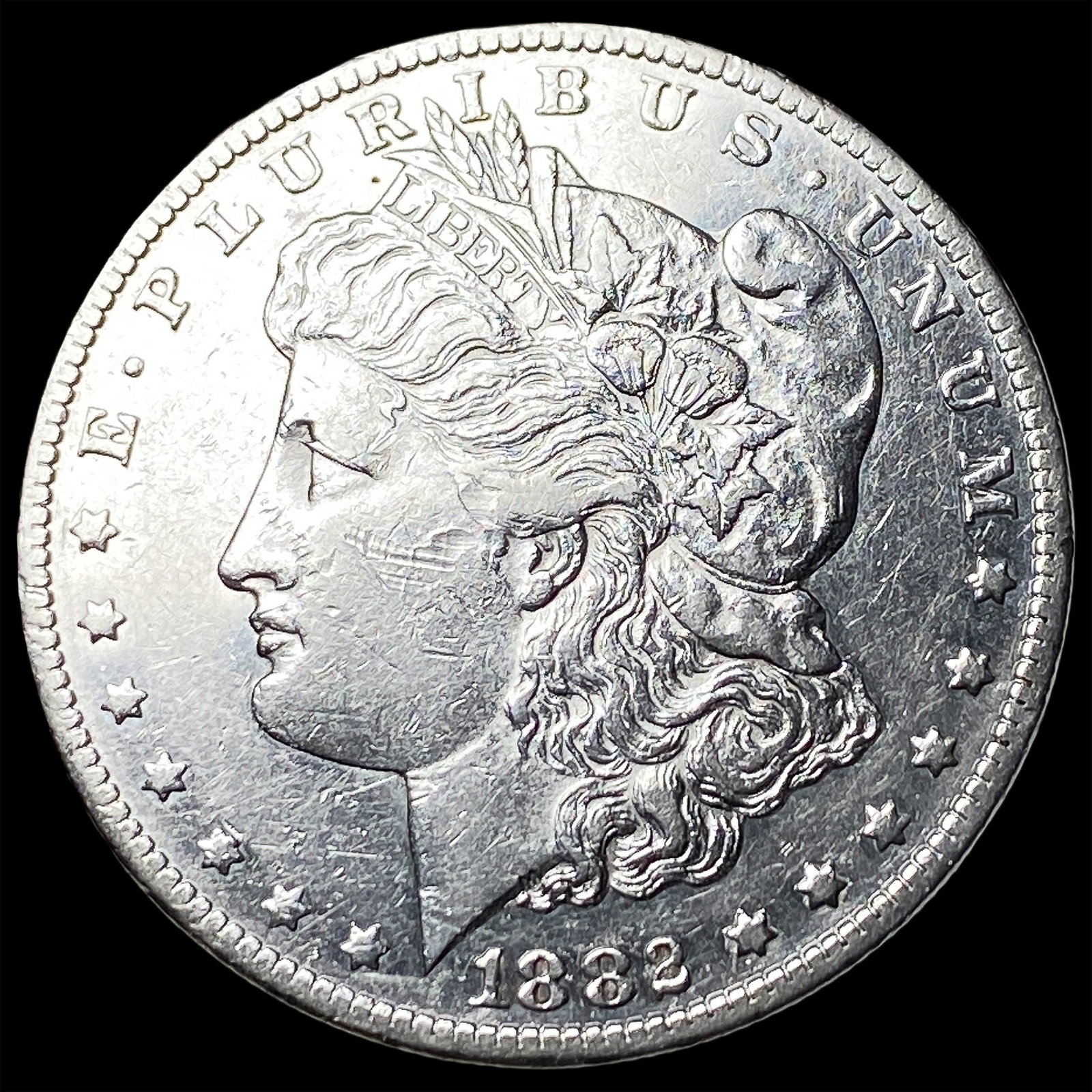1882-CC Silver Morgan Dollar CLOSELY UNCIRCULATED (1 of 2)
