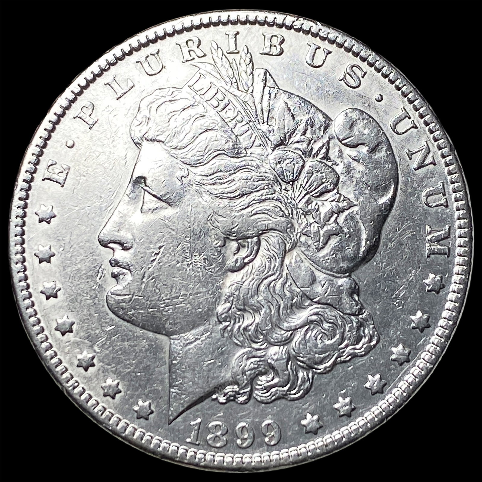 1899 Morgan Silver Dollar CLOSELY UNCIRCULATED (1 of 2)