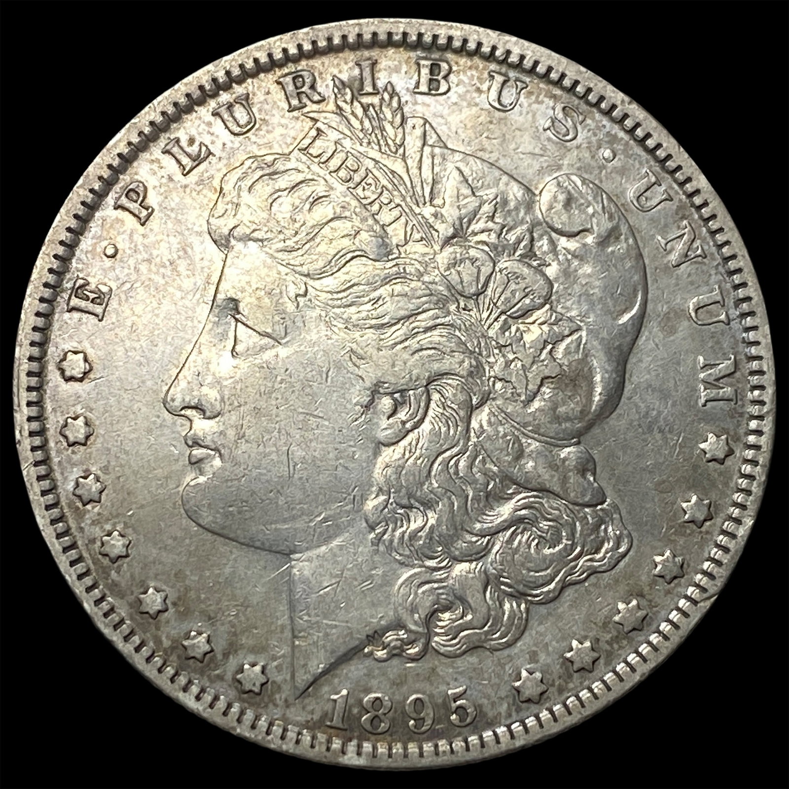 1895-O Silver Morgan Dollar NEARLY UNCIRCULATED (1 of 2)