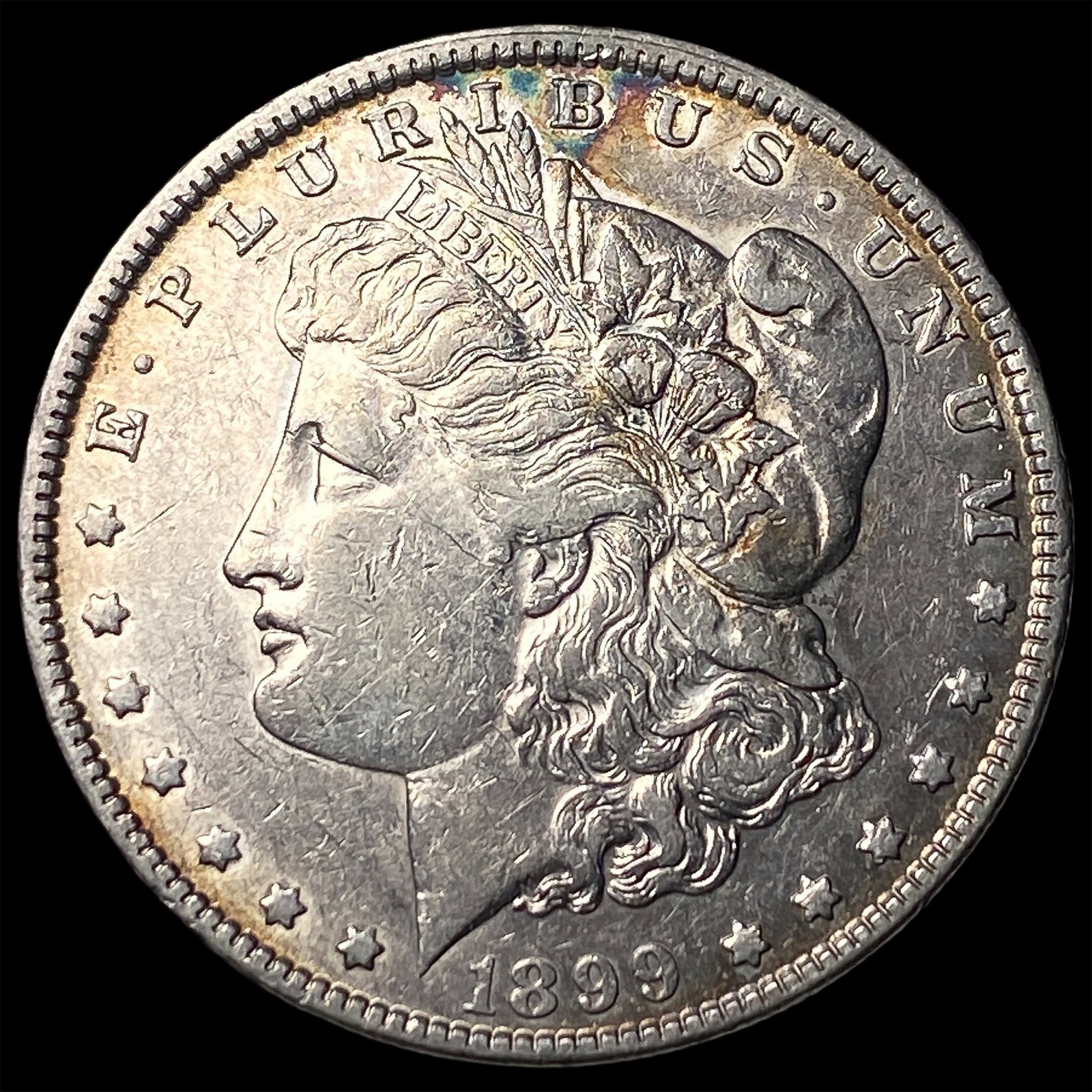 1899 Silver Morgan Dollar CLOSELY UNCIRCULATED: 1899 Silver Morgan Dollar CLOSELY UNCIRCULATED