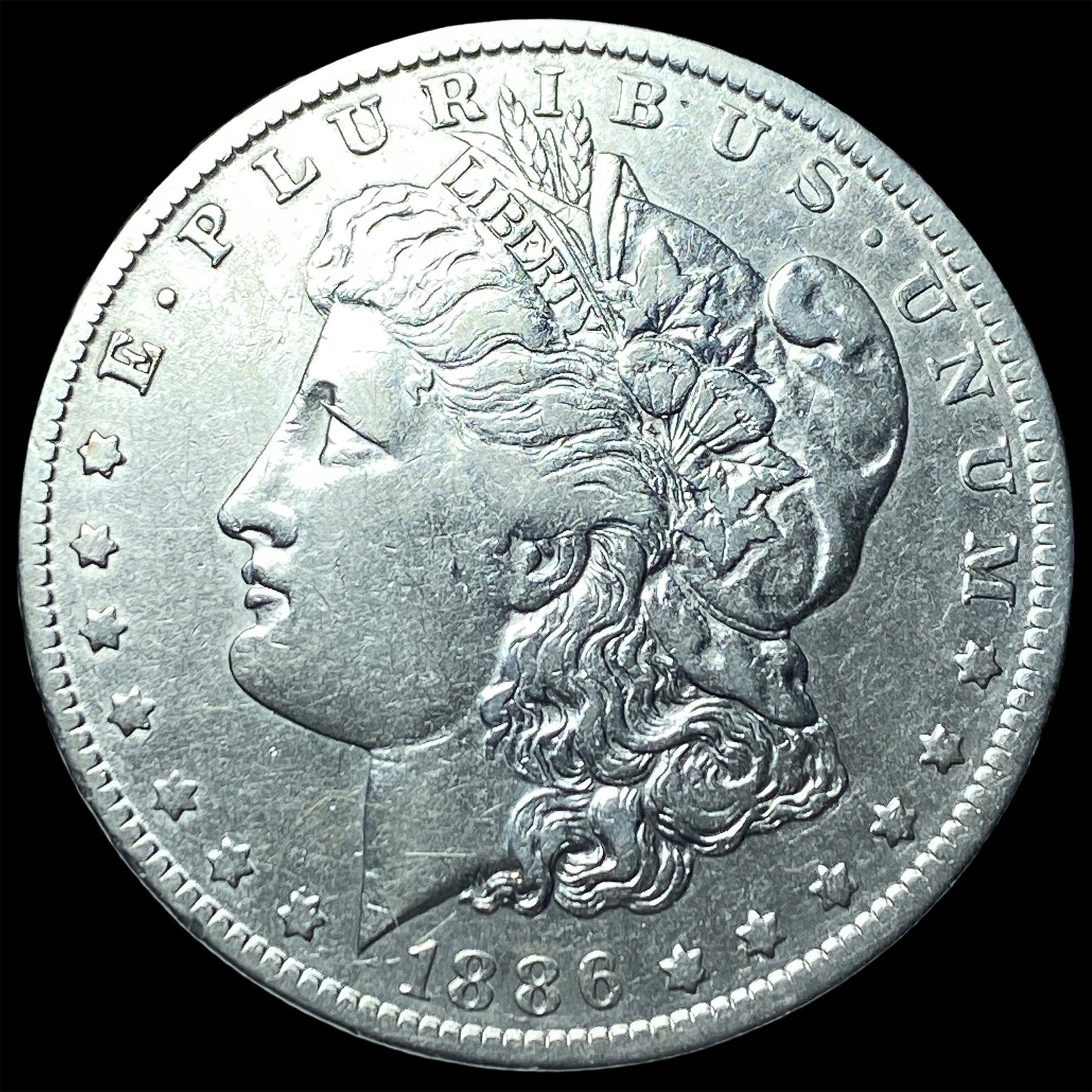 1886-O Silver Morgan Dollar NEARLY UNCIRCULATED (1 of 2)