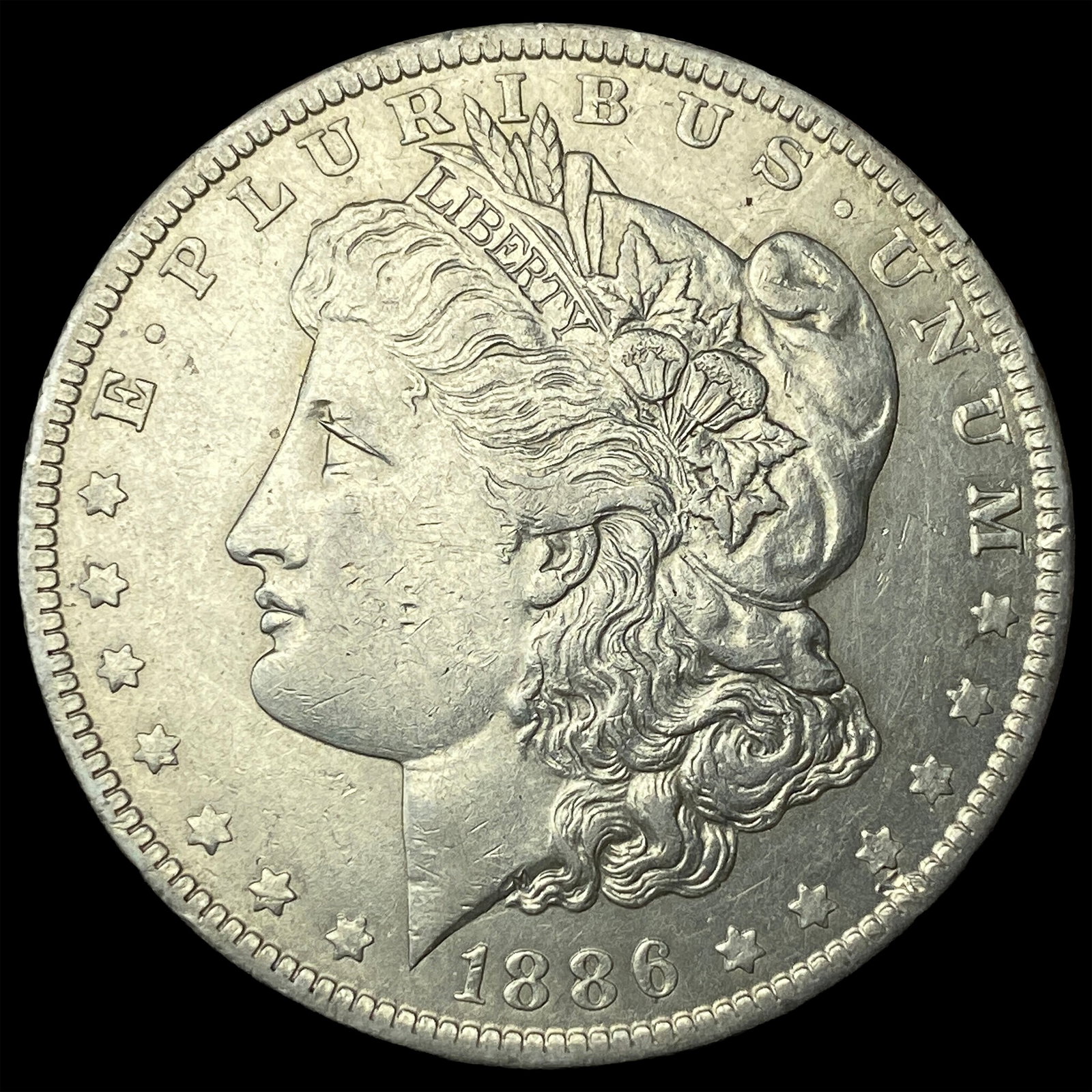 1886-O Silver Morgan Dollar CLOSELY UNCIRCULATED: 1886-O Silver Morgan Dollar CLOSELY UNCIRCULATED
