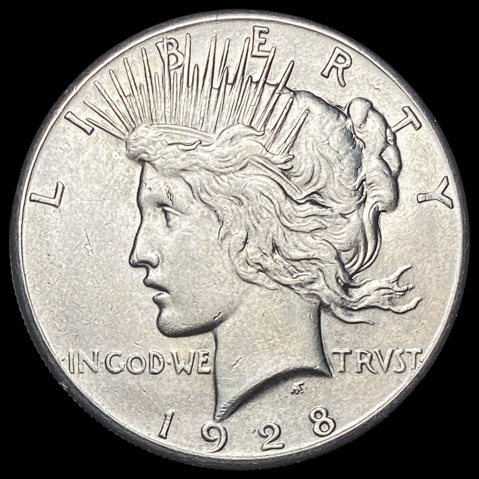 1928 Silver Peace Dollar CLOSELY UNCIRCULATED (1 of 2)