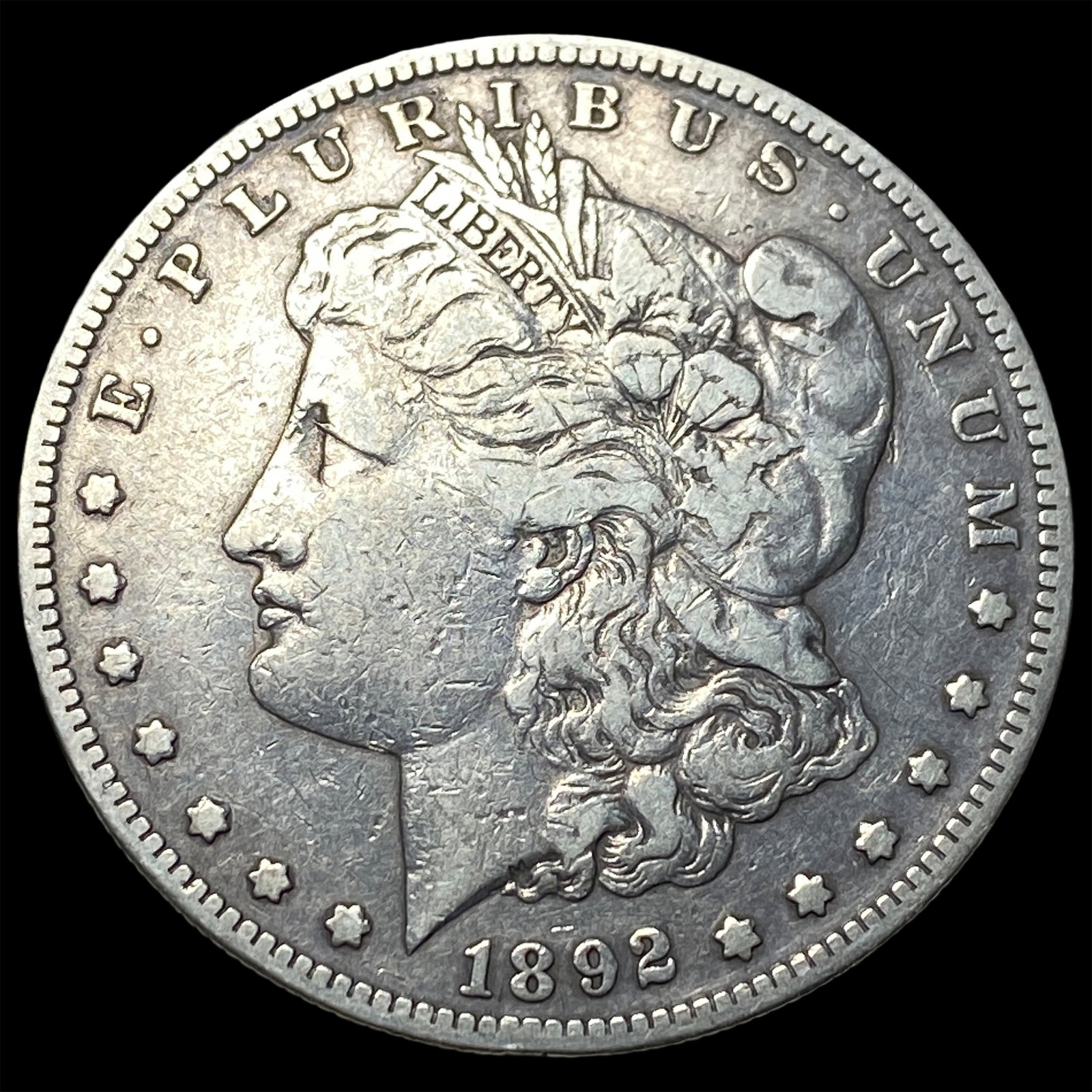1892-S Silver Morgan Dollar NEARLY UNCIRCULATED (1 of 2)