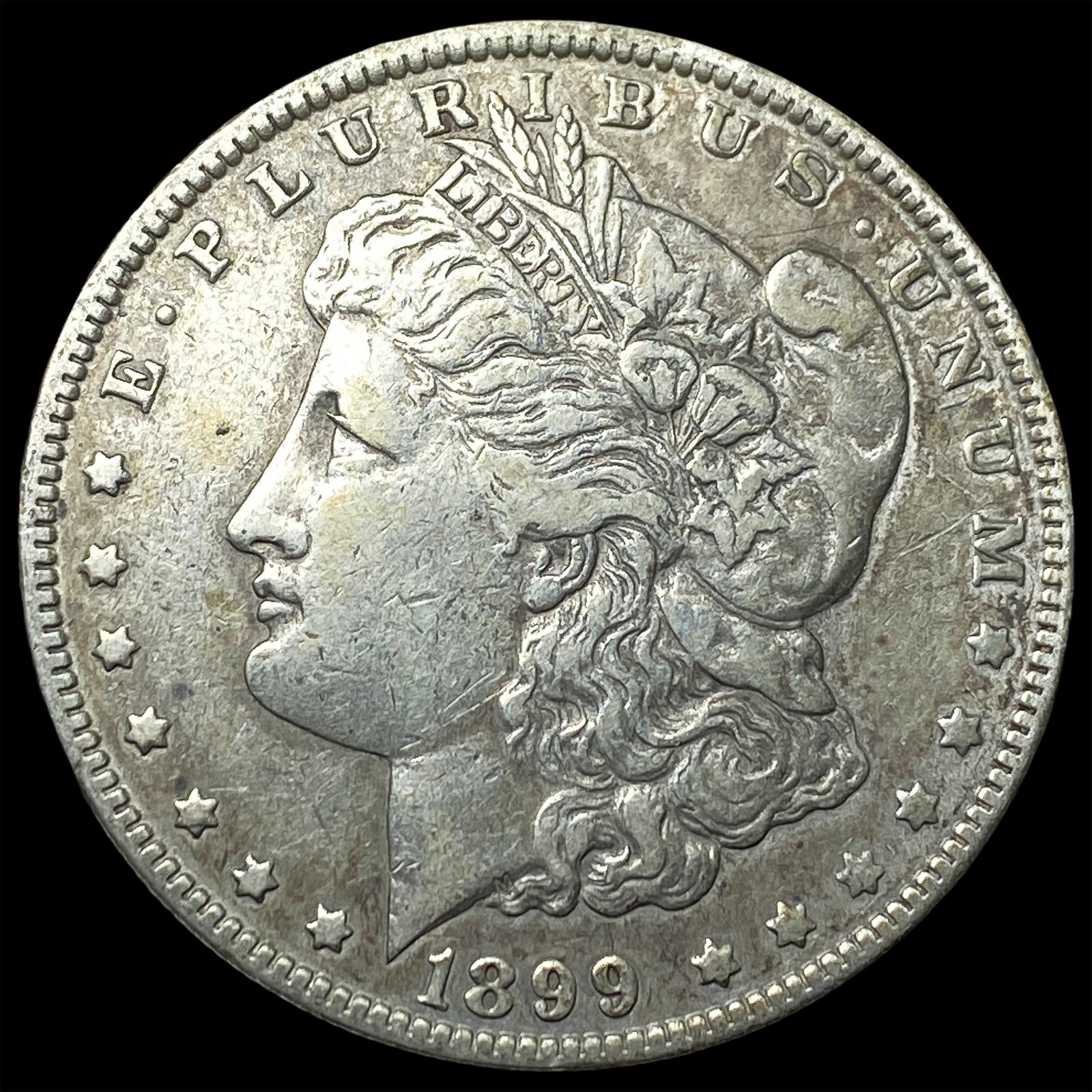 1899-O Micro O Morgan Silver Dollar NEARLY UNCIRCULATED: 1899-O Micro O Morgan Silver Dollar NEARLY UNCIRCULATED