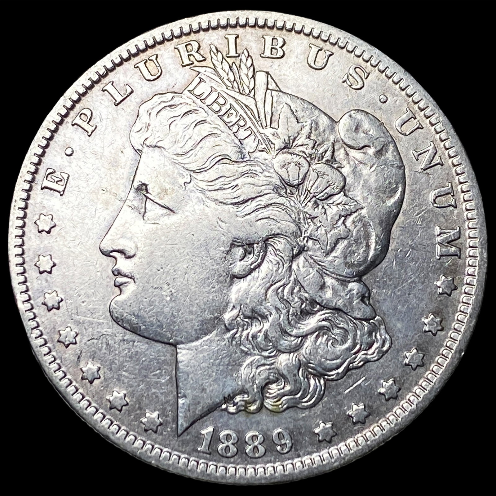 1889-O Silver Morgan Dollar NEARLY UNCIRCULATED (1 of 2)