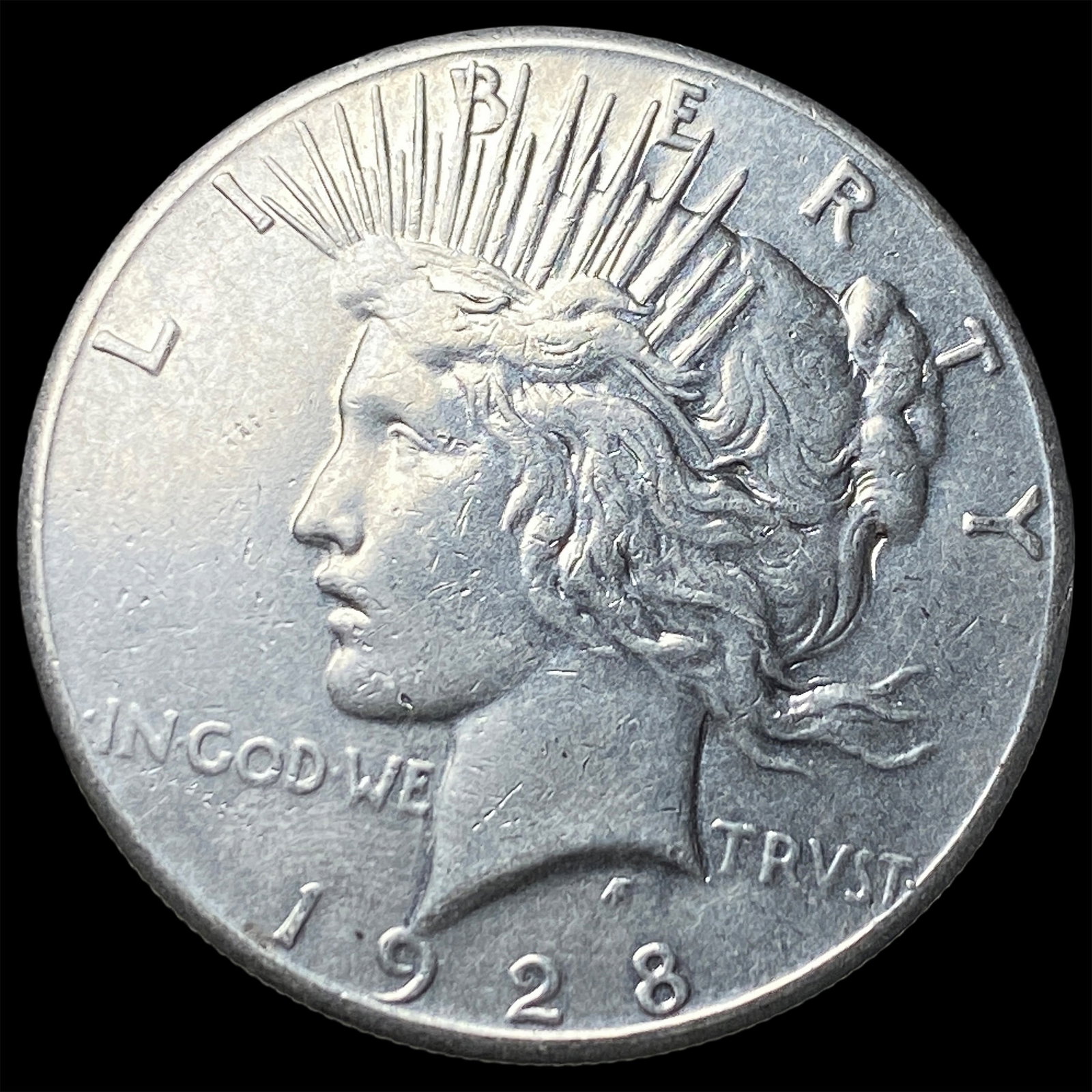 1928 Silver Peace Dollar CLOSELY UNCIRCULATED (1 of 2)