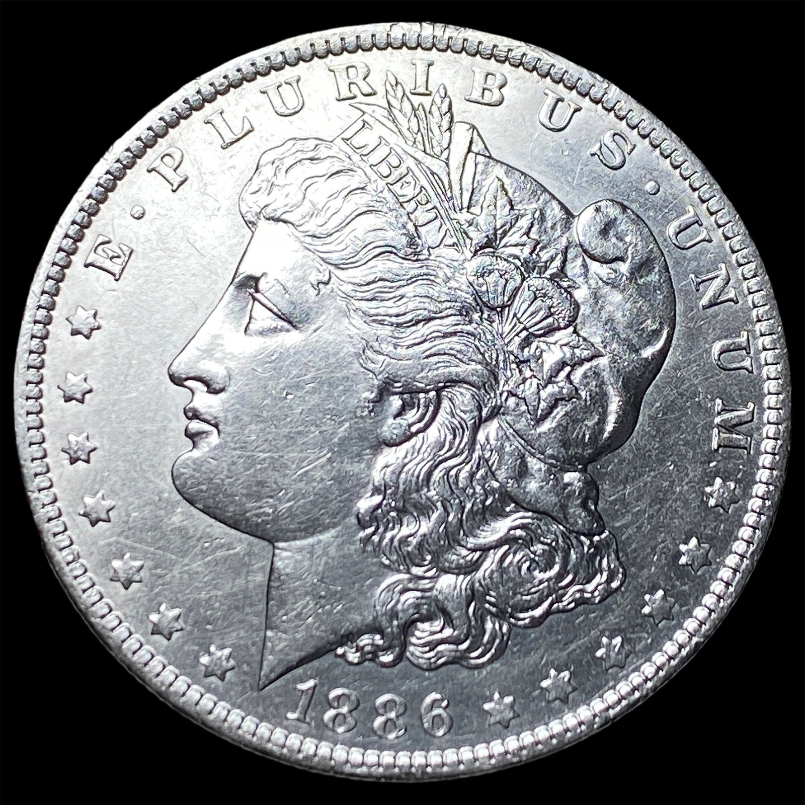 1886-O Silver Morgan Dollar CLOSELY UNCIRCULATED: 1886-O Silver Morgan Dollar CLOSELY UNCIRCULATED
