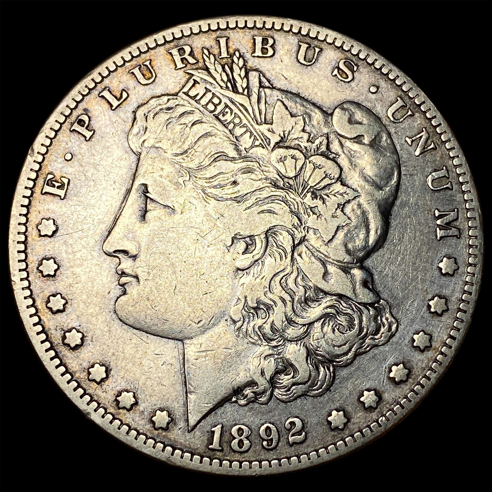 1892-S Silver Morgan Dollar NEARLY UNCIRCULATED (1 of 2)