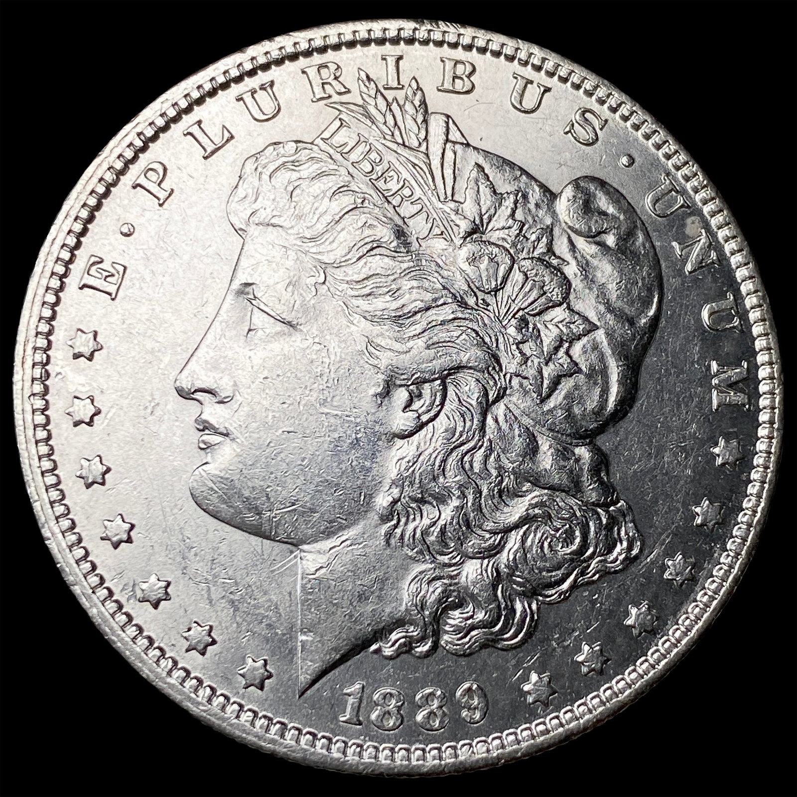 1889-O Morgan Silver Dollar CLOSELY UNCIRCULATED: 1889-O Morgan Silver Dollar CLOSELY UNCIRCULATED