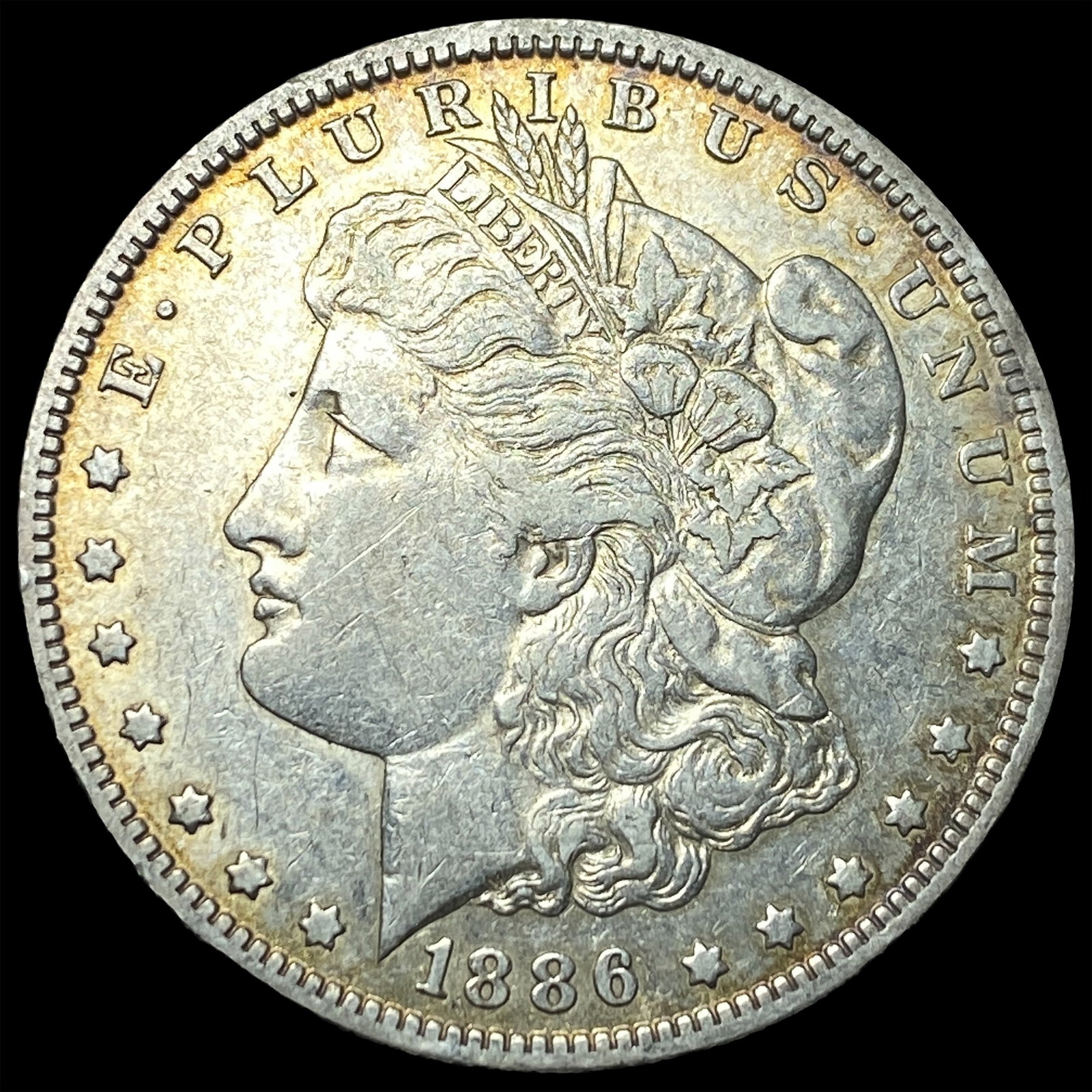 1886-O Silver Morgan Dollar NEARLY UNCIRCULATED (1 of 2)