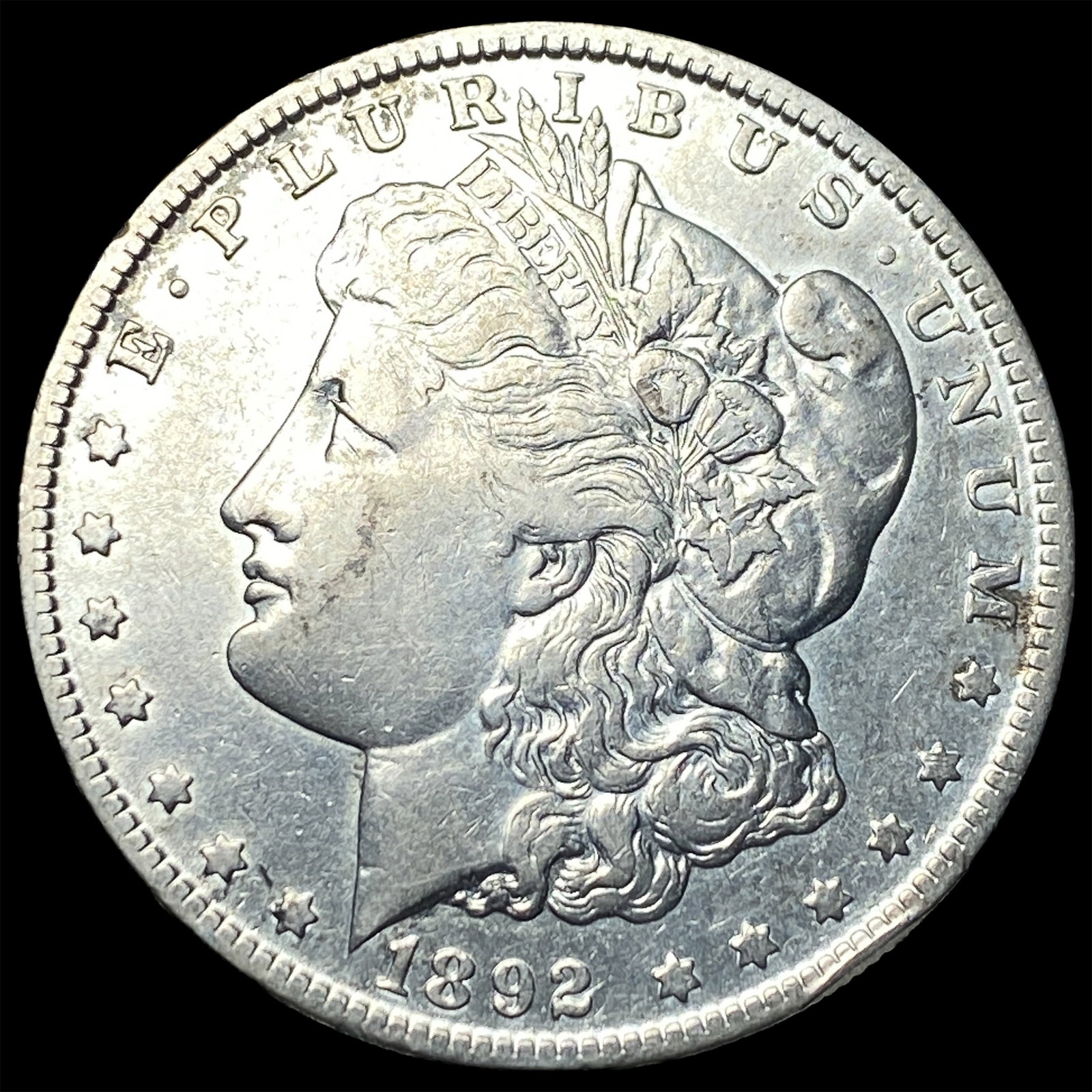 1892-O Silver Morgan Dollar NEARLY UNCIRCULATED (1 of 2)