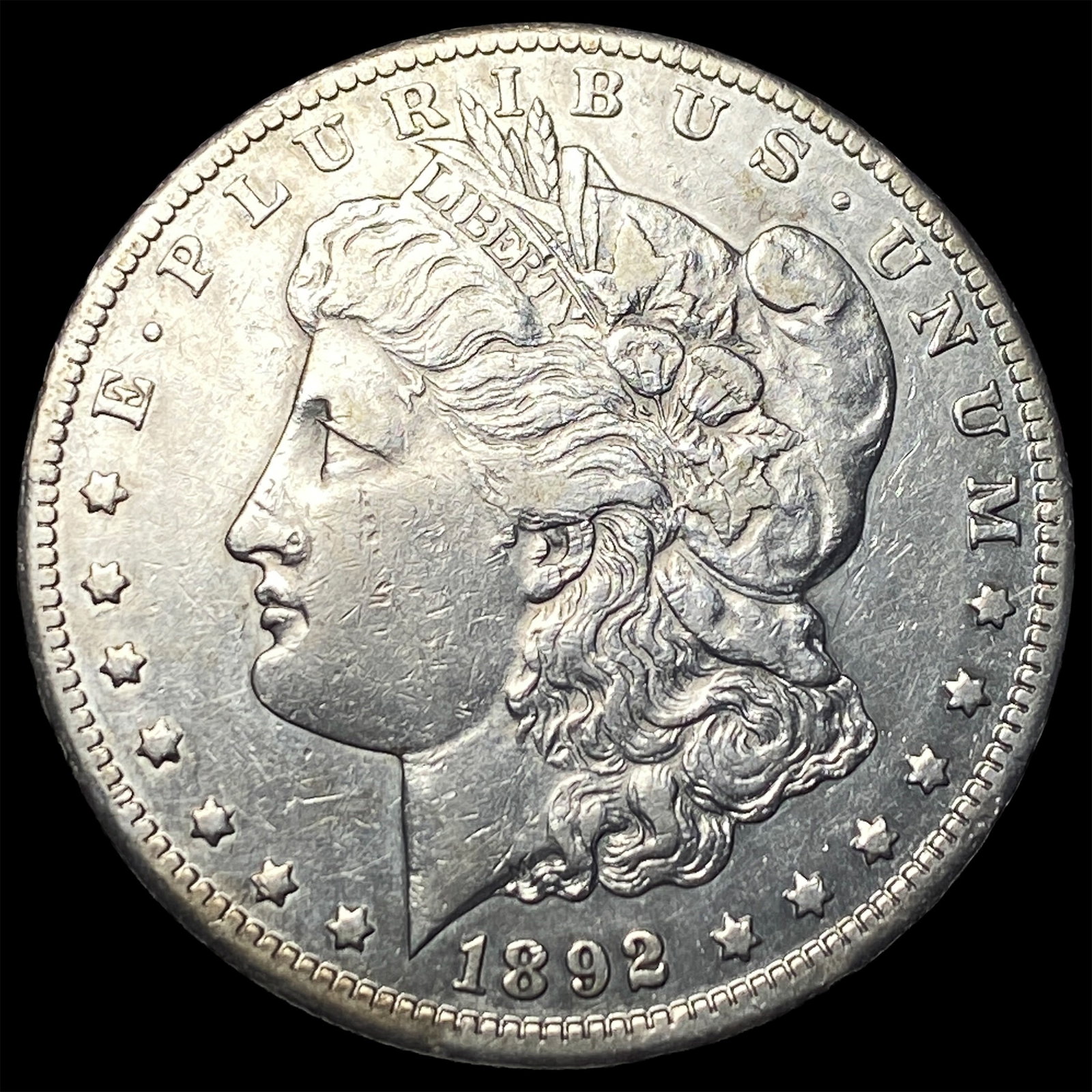 1892-CC Silver Morgan Dollar NEARLY UNCIRCULATED (1 of 2)