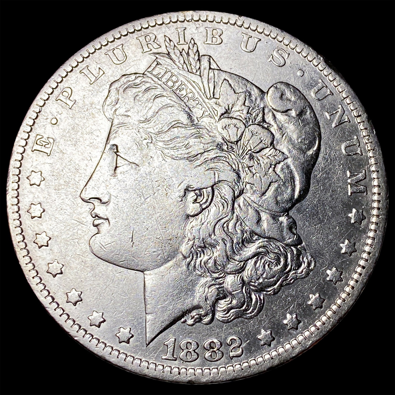 1882-O/S Silver Morgan Dollar ABOUT UNCIRCULATED: 1882-O/S Silver Morgan Dollar ABOUT UNCIRCULATED
