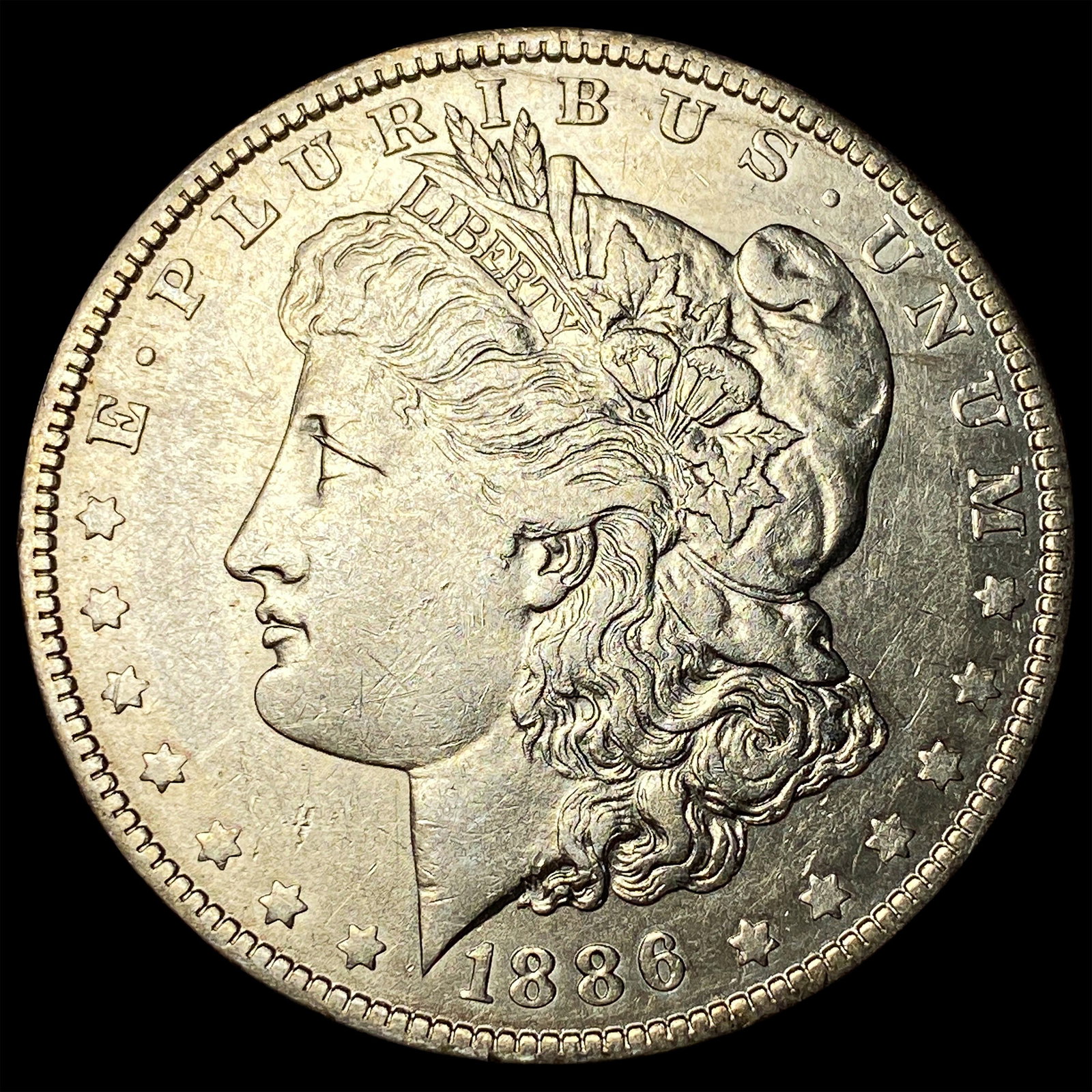 1886-O Silver Morgan Dollar CLOSELY UNCIRCULATED (1 of 2)