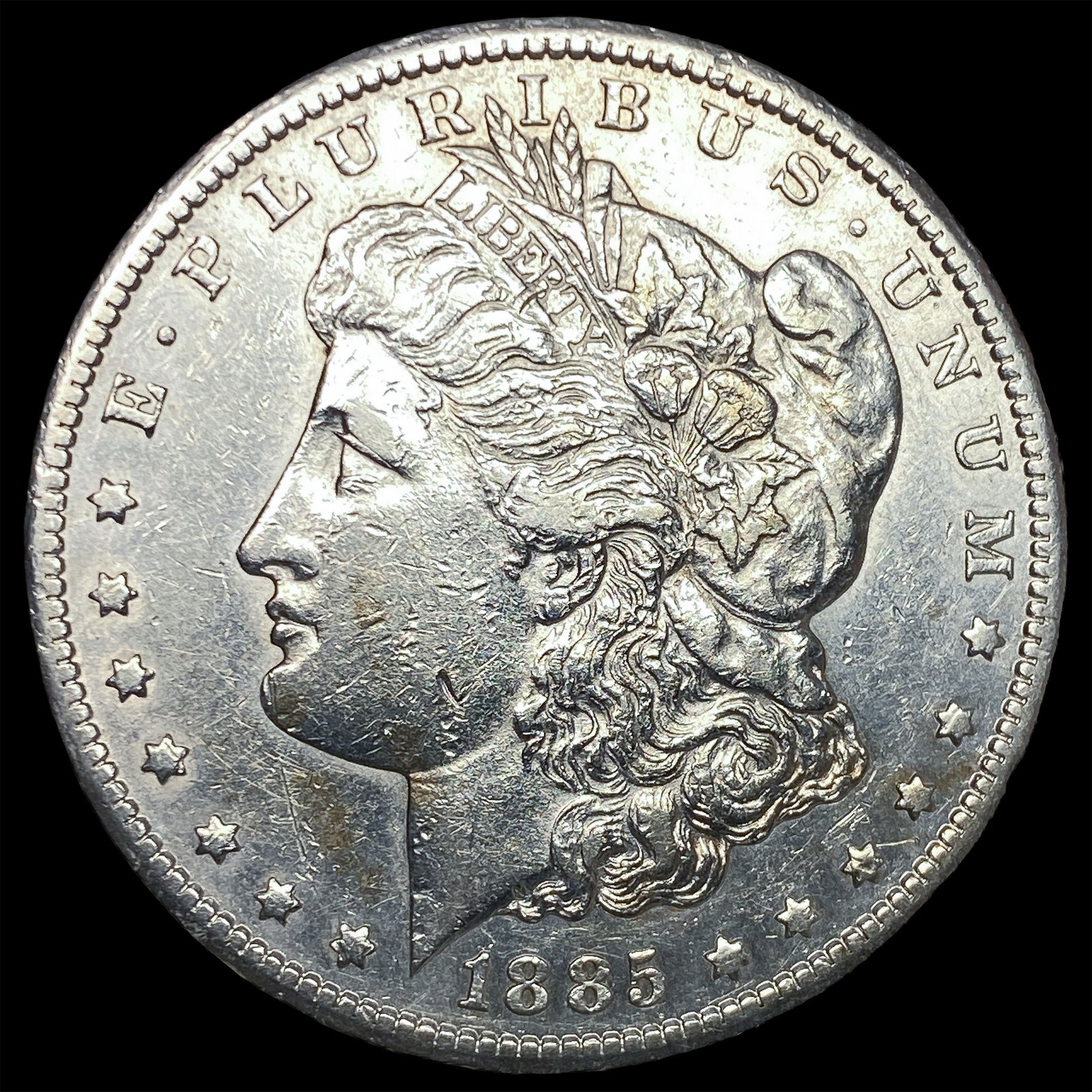 1885-CC Silver Morgan Dollar CLOSELY UNCIRCULATED: 1885-CC Silver Morgan Dollar CLOSELY UNCIRCULATED