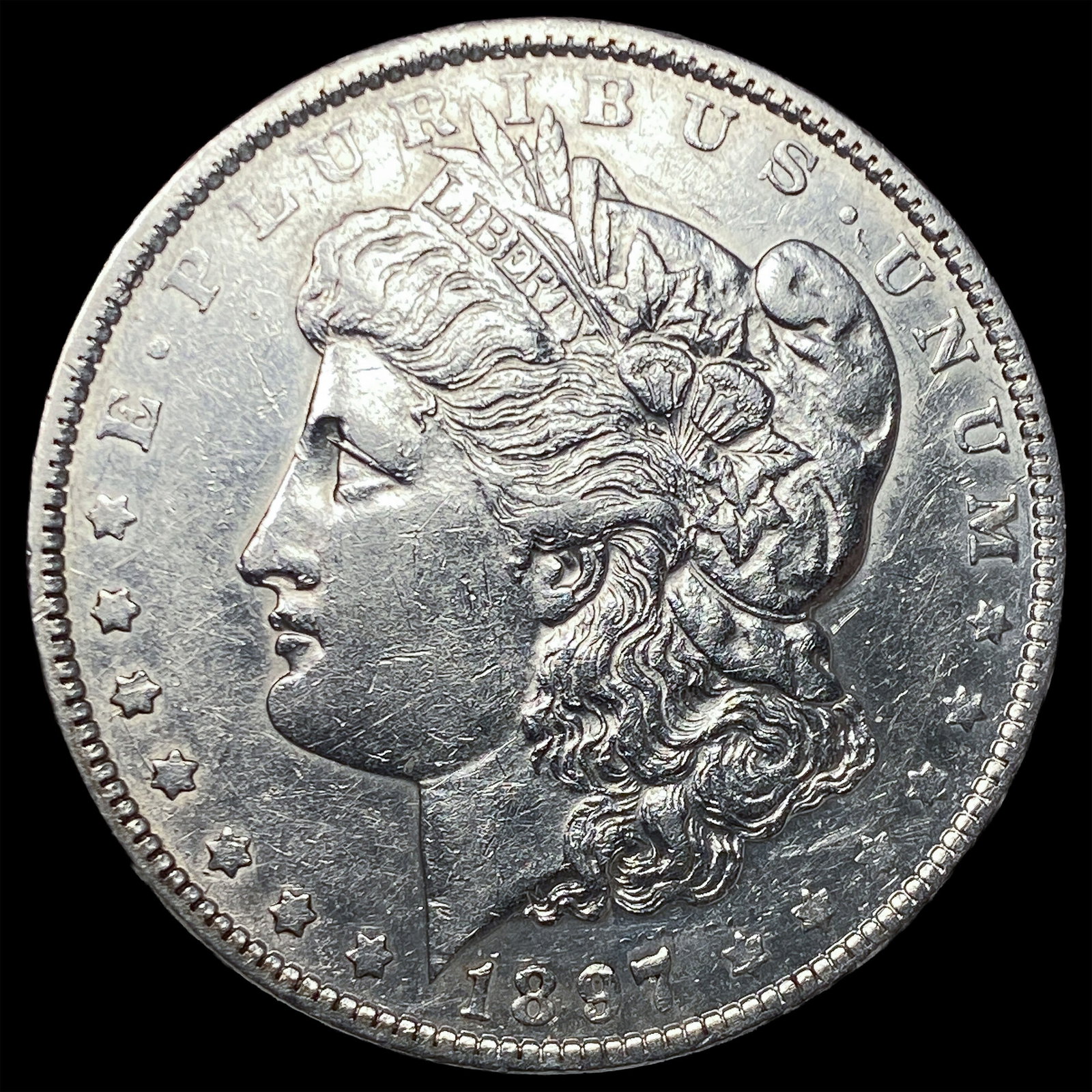 1887-O Silver Morgan Dollar CLOSELY UNCIRCULATED (1 of 2)