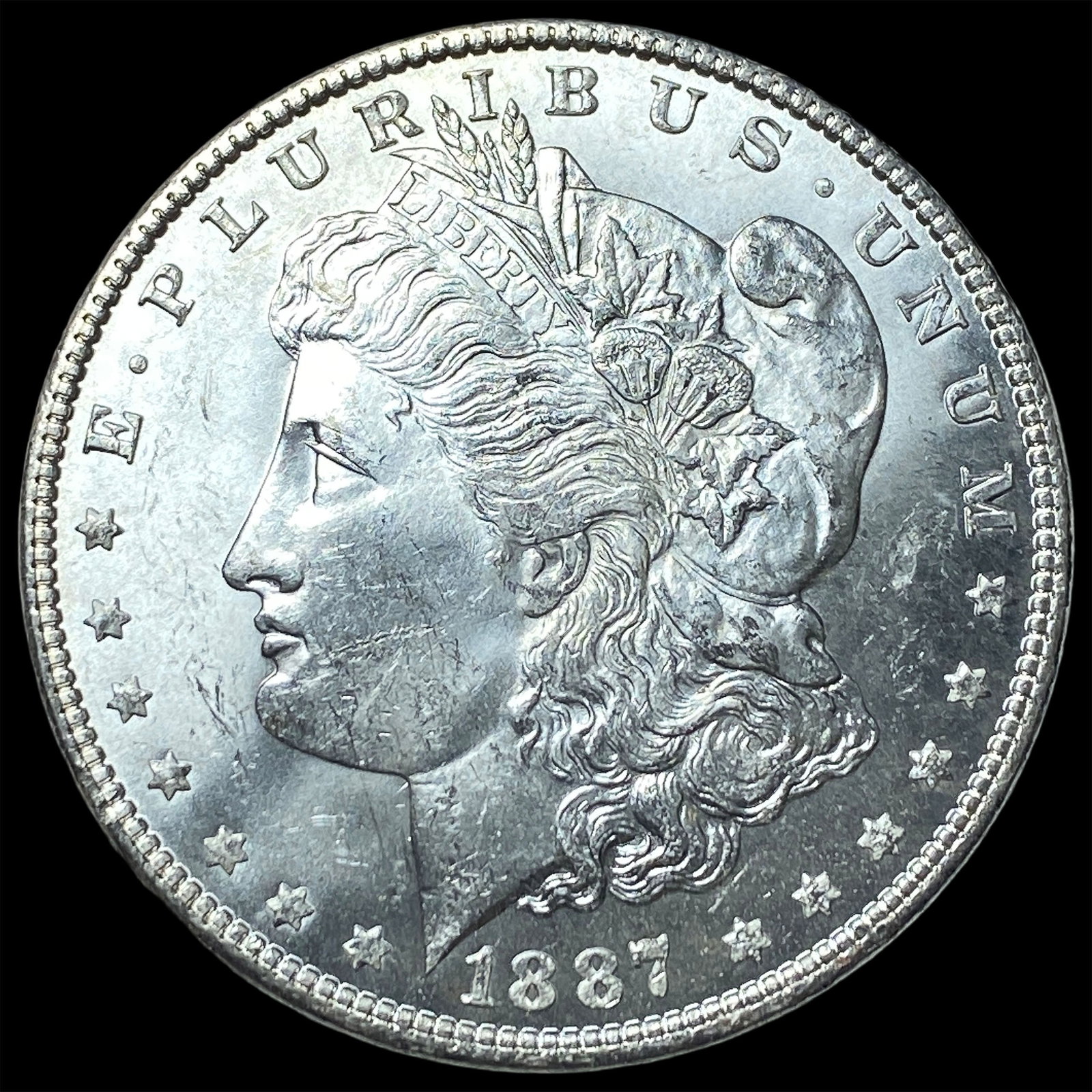 1887 Silver Morgan Dollar GEM BU (1 of 2)