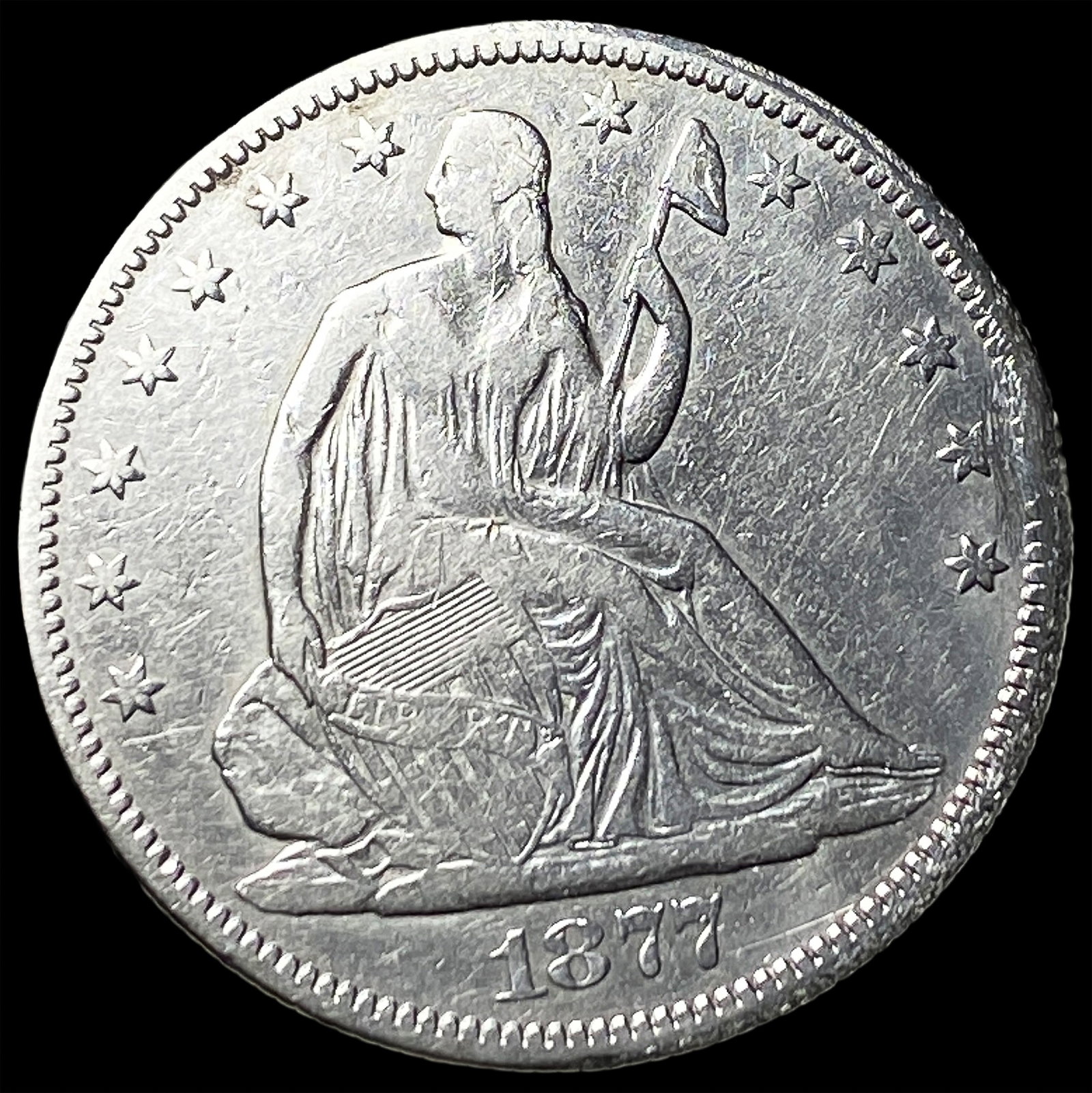 1877-S Seated Liberty Half Dollar ABOUT UNCIRCULATED: 1877-S Seated Liberty Half Dollar ABOUT UNCIRCULATED