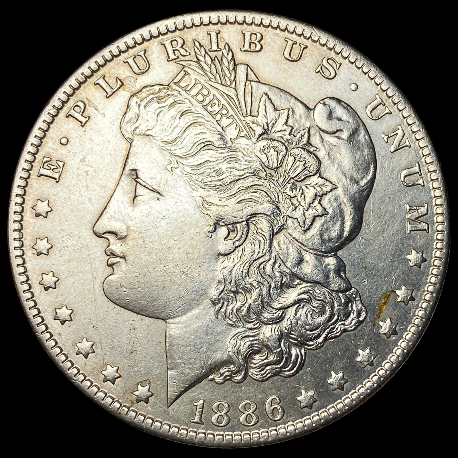 1886-O Silver Morgan Dollar CLOSELY UNCIRCULATED: 1886-O Silver Morgan Dollar CLOSELY UNCIRCULATED