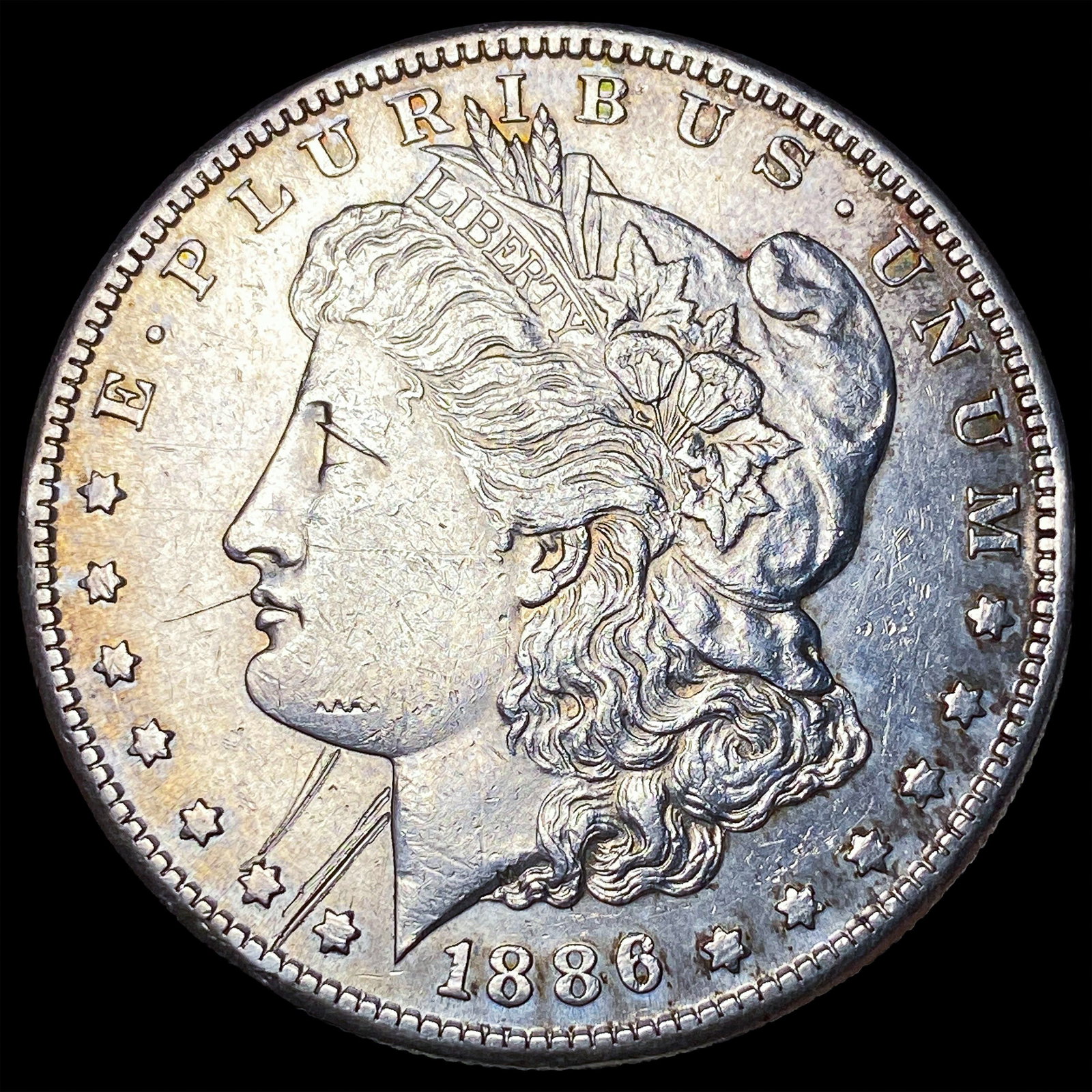 1886-S Silver Morgan Dollar ABOUT UNCIRCULATED: 1886-S Silver Morgan Dollar ABOUT UNCIRCULATED