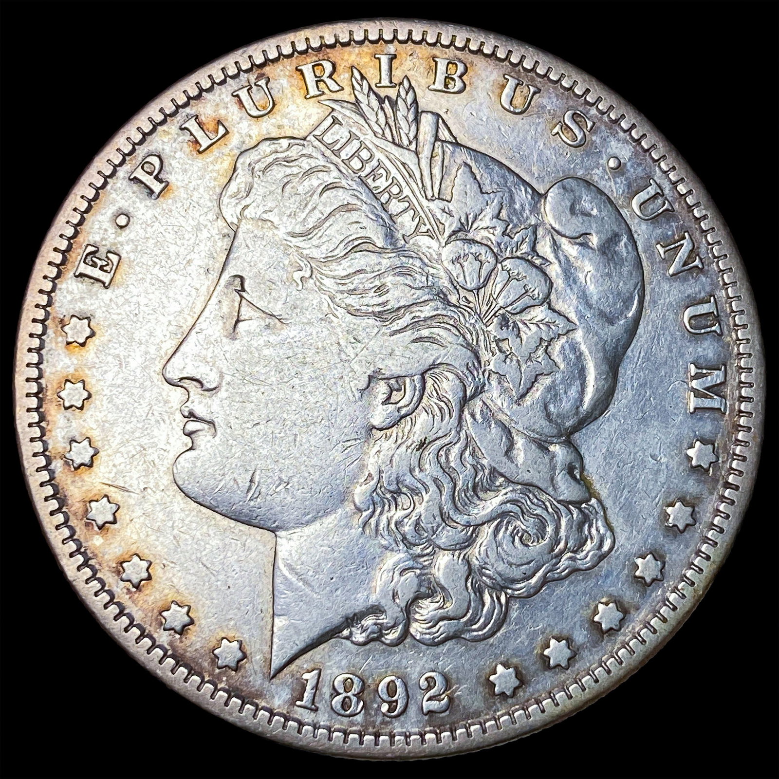 1892-S Morgan Silver Dollar ABOUT UNCIRCULATED: 1892-S Morgan Silver Dollar ABOUT UNCIRCULATED