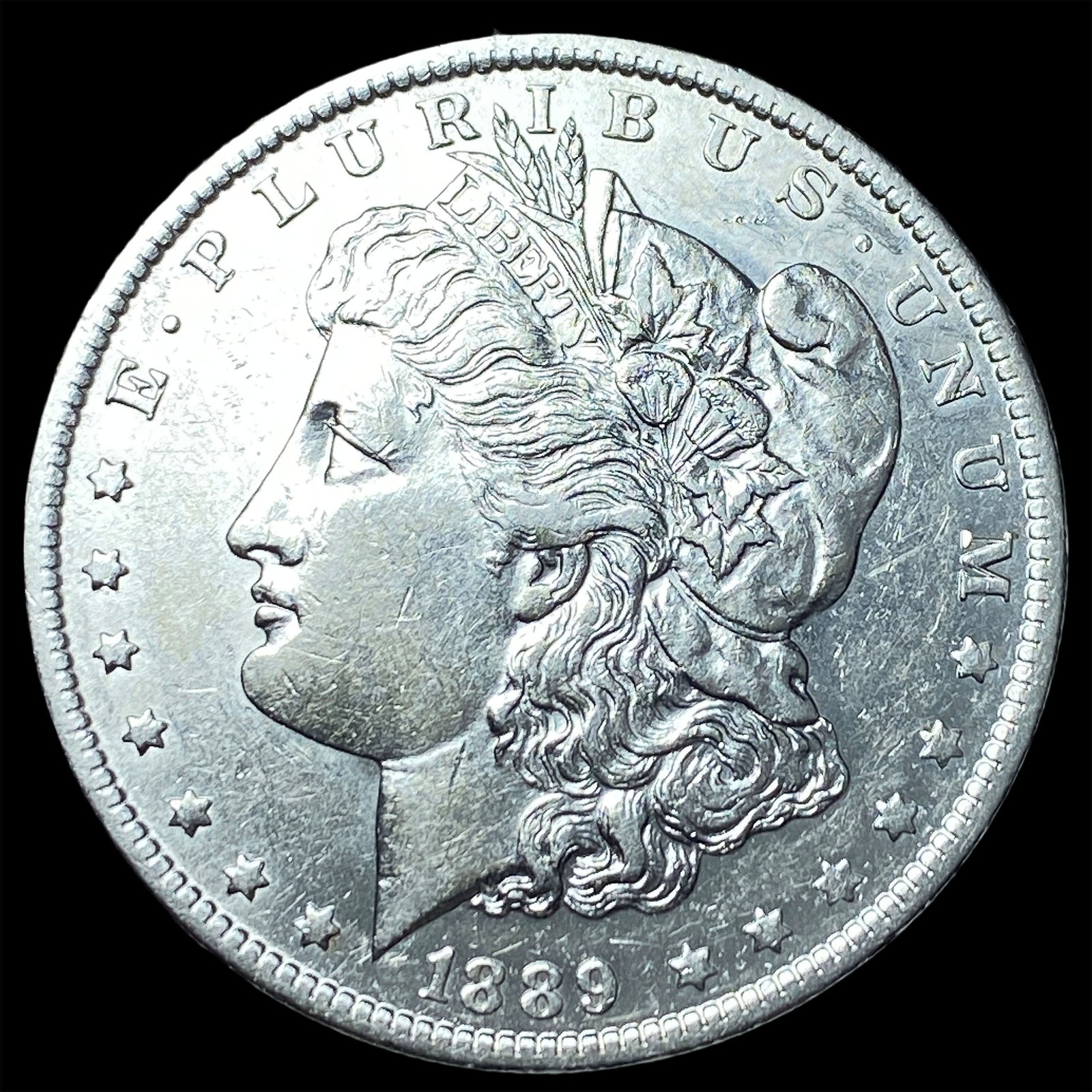 1889-O Silver Morgan Dollar CLOSELY UNCIRCULATED (1 of 2)