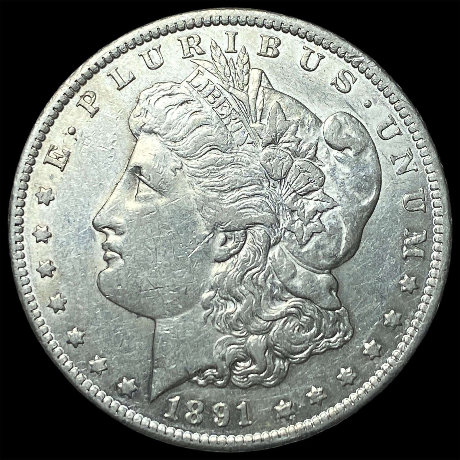 1891-CC Silver Morgan Dollar CLOSELY UNCIRCULATED: 1891-CC Silver Morgan Dollar CLOSELY UNCIRCULATED
