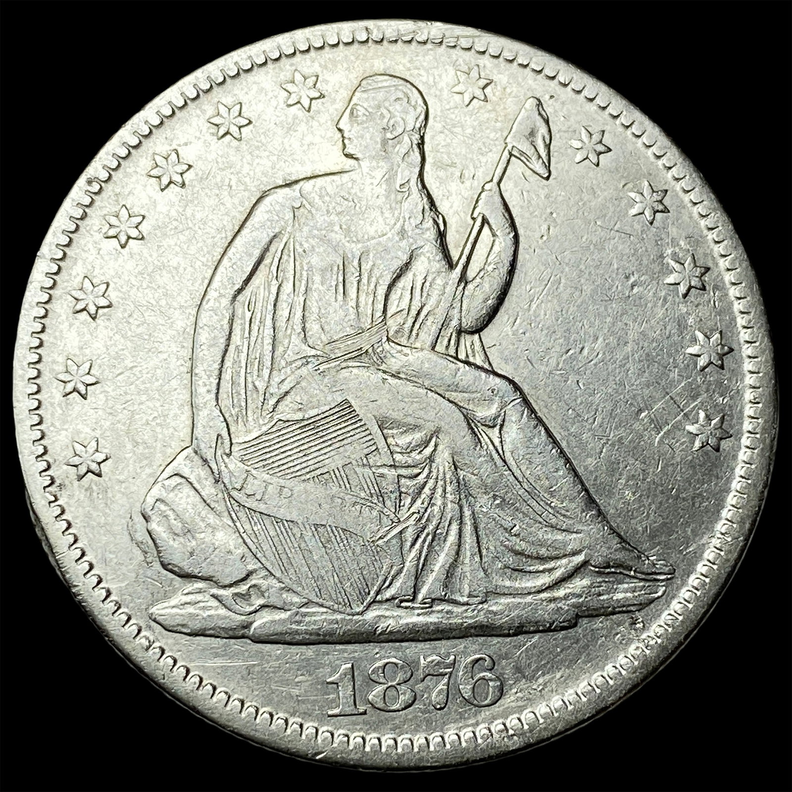 1876-CC Silver Seated Liberty Half Dollar ABOUT UNCIRCULATED: 1876-CC Silver Seated Liberty Half Dollar ABOUT UNCIRCULATED