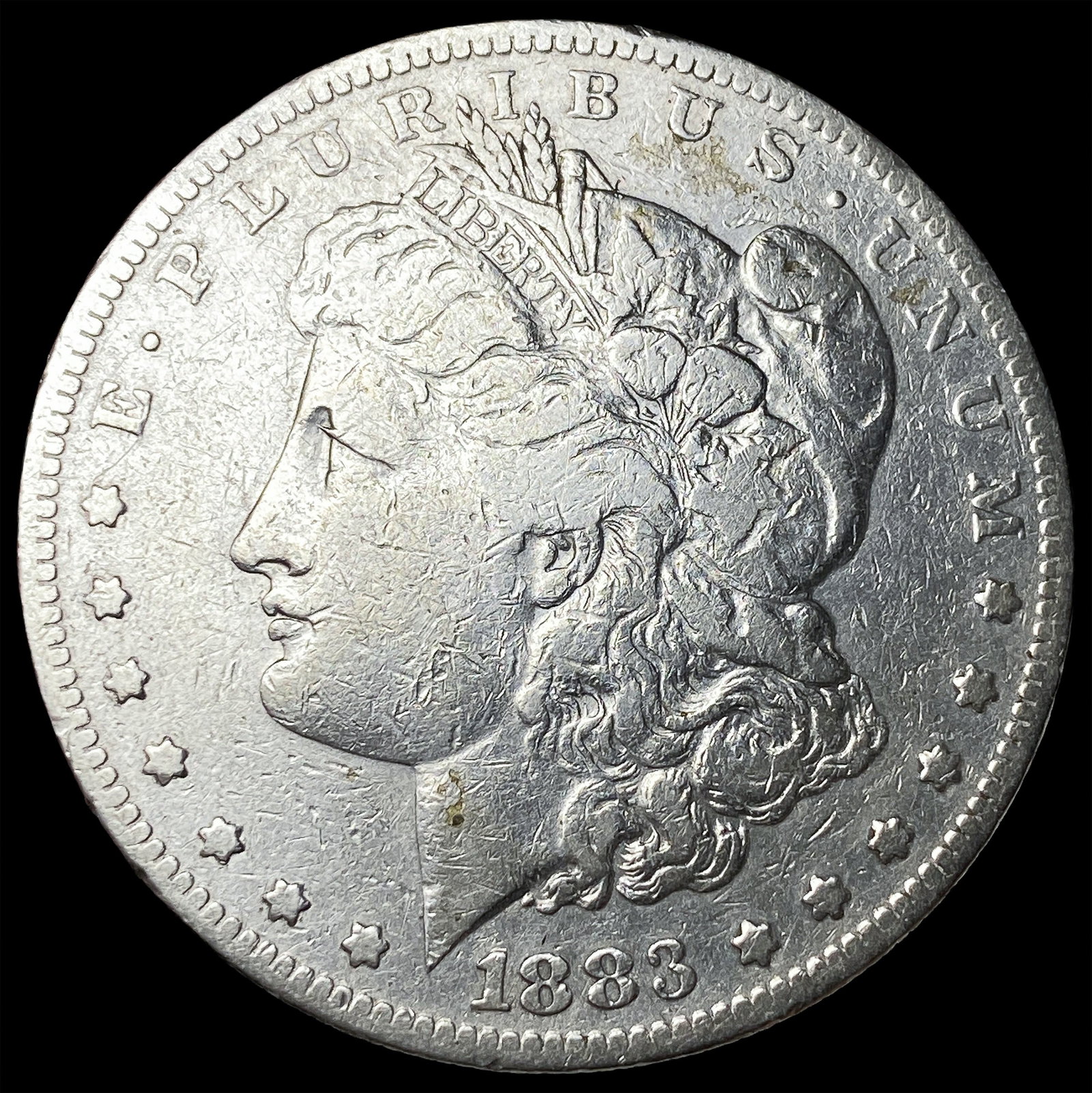 1883-S Silver Morgan Dollar ABOUT UNCIRCULATED (1 of 2)