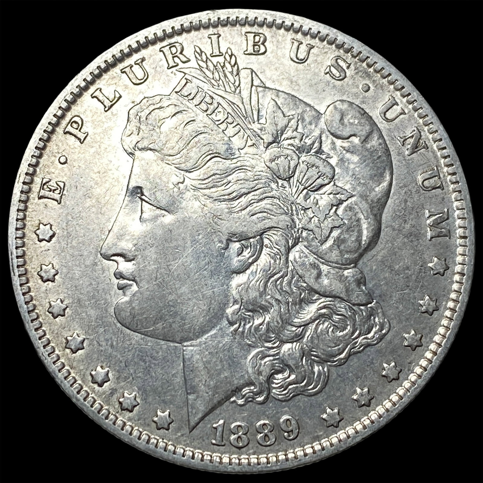 1889-O Silver Morgan Dollar NEARLY UNCIRCULATED (1 of 2)