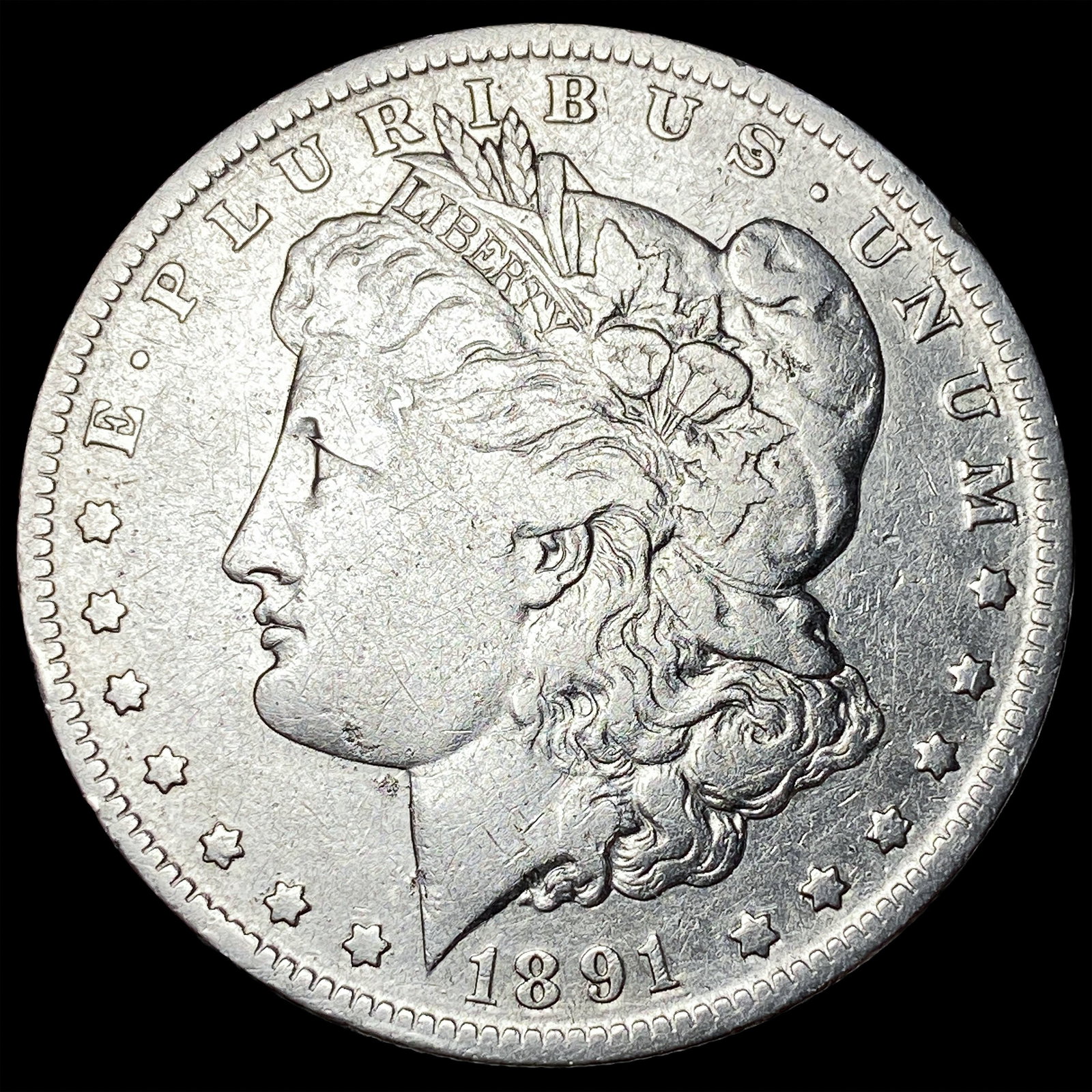 1891-O Silver Morgan Dollar ABOUT UNCIRCULATED: 1891-O Silver Morgan Dollar ABOUT UNCIRCULATED