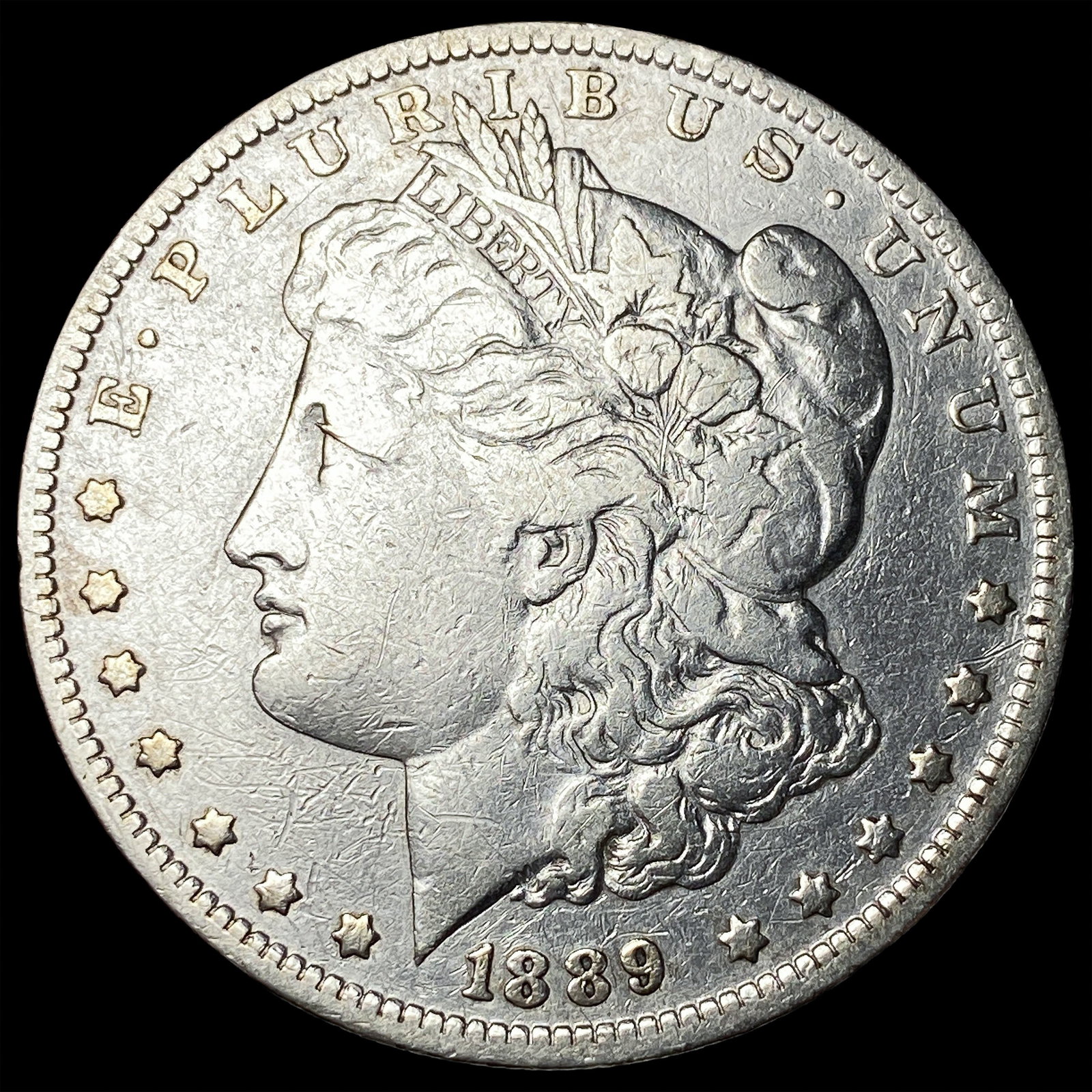 1889-O Silver Morgan Dollar ABOUT UNCIRCULATED (1 of 2)