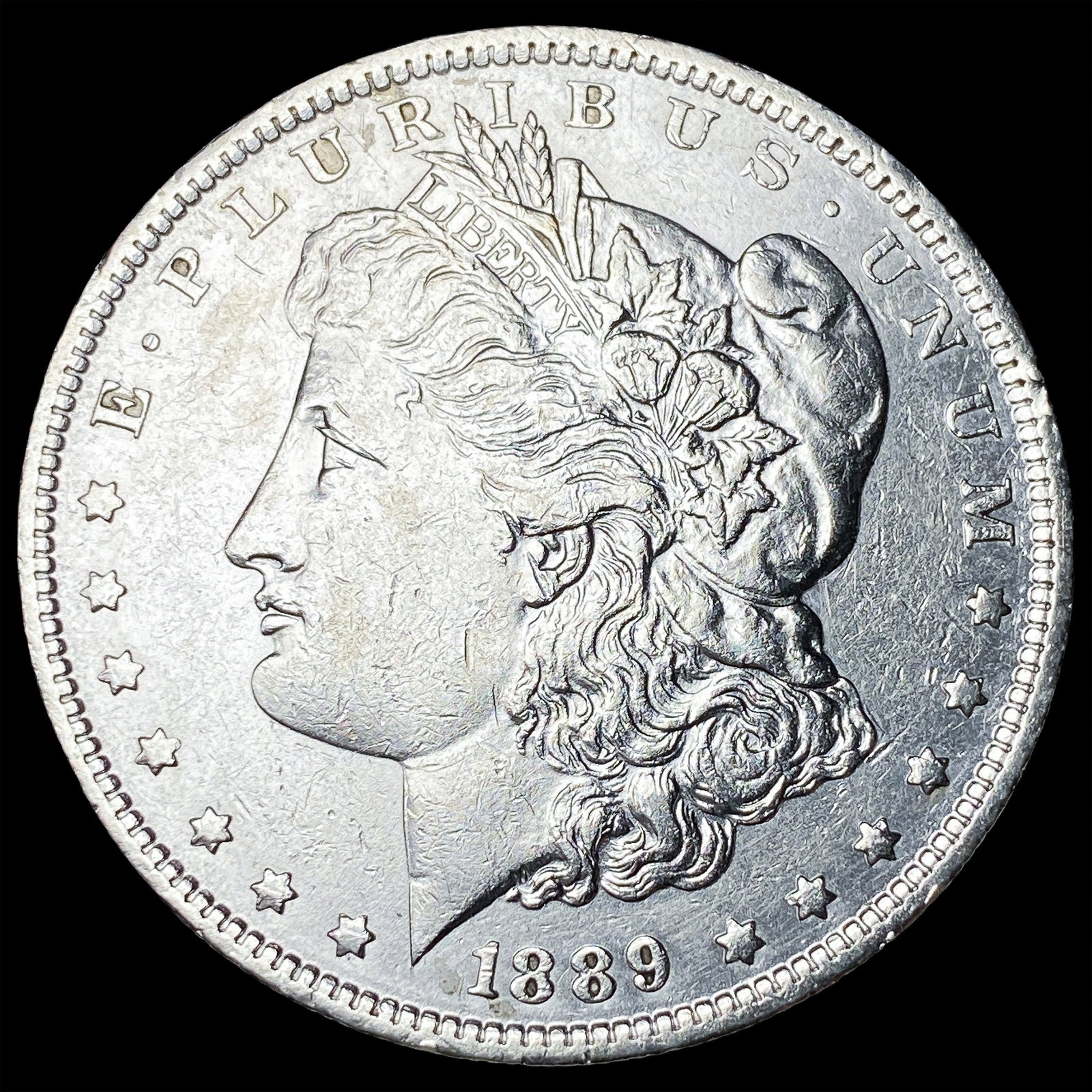 1889-O Morgan Silver Dollar CLOSELY UNCIRCULATED: 1889-O Morgan Silver Dollar CLOSELY UNCIRCULATED