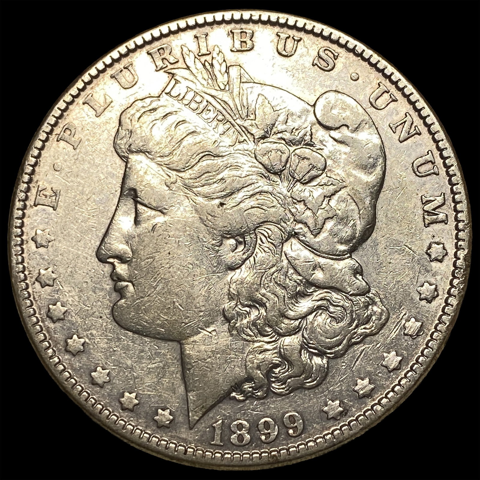 1899 Morgan Silver Dollar NEARLY UNCIRCULATED (1 of 2)