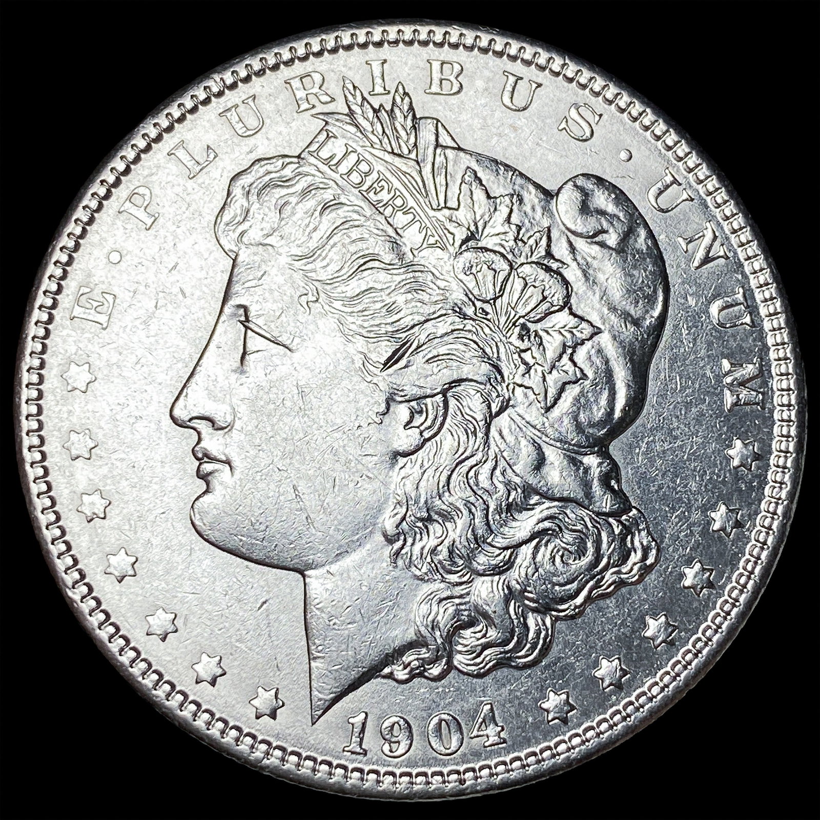 1904 Silver Morgan Dollar CLOSELY UNCIRCULATED: 1904 Silver Morgan Dollar CLOSELY UNCIRCULATED