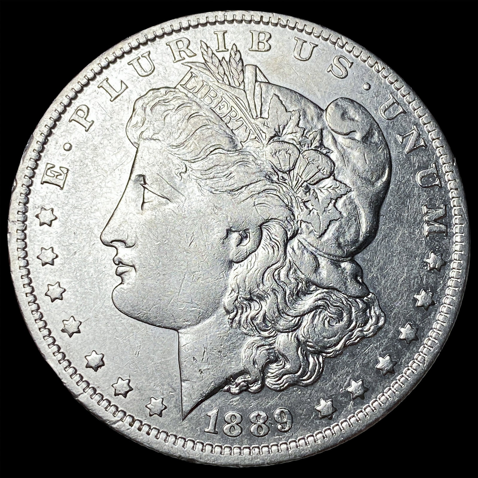 1889-O Silver Morgan Dollar NEARLY UNCIRCULATED (1 of 2)