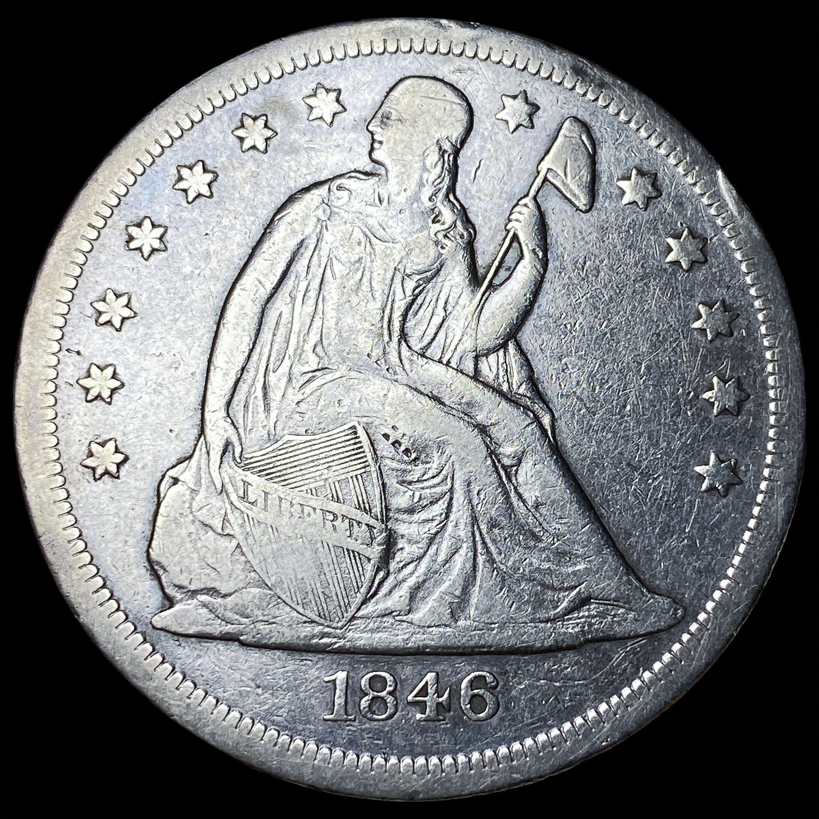 1846-O Silver Seated Liberty Dollar ABOUT UNCIRCULATED: 1846-O Silver Seated Liberty Dollar ABOUT UNCIRCULATED