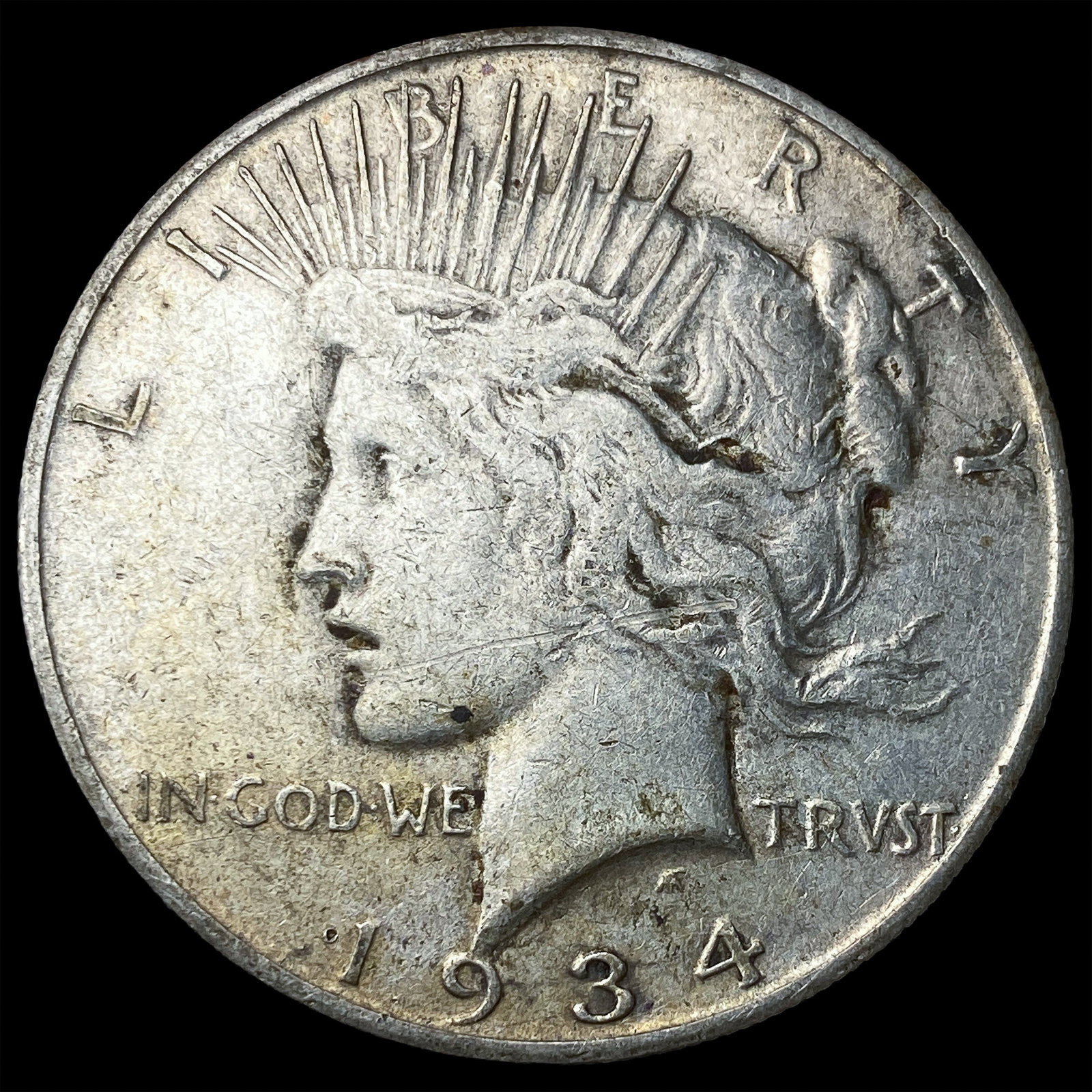 1934-S Silver Peace Dollar NEARLY UNCIRCULATED (1 of 2)