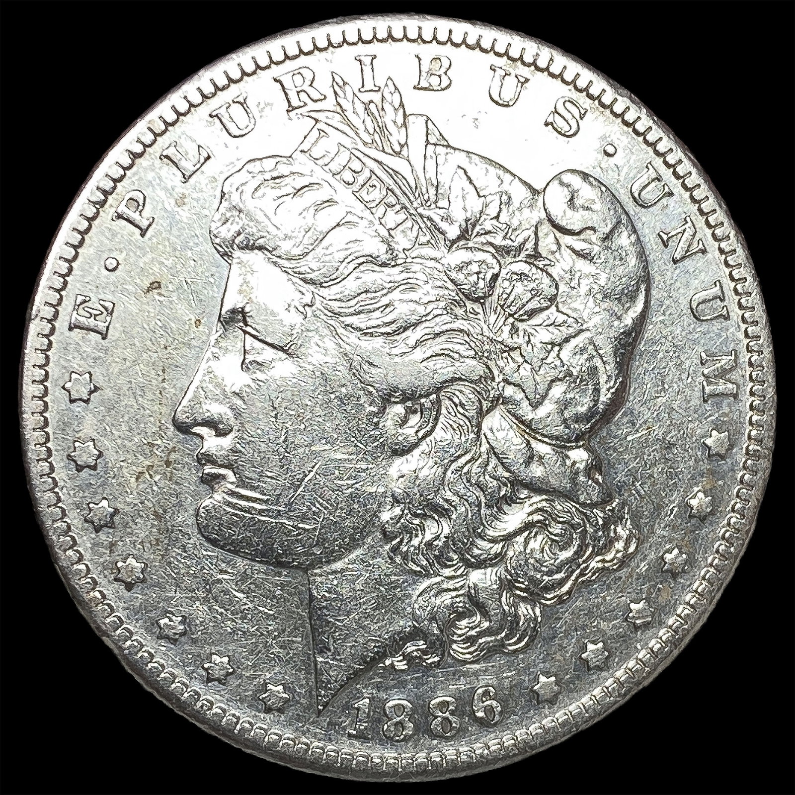 1886 Morgan Silver Dollar NEARLY UNCIRCULATED: 1886 Morgan Silver Dollar NEARLY UNCIRCULATED
