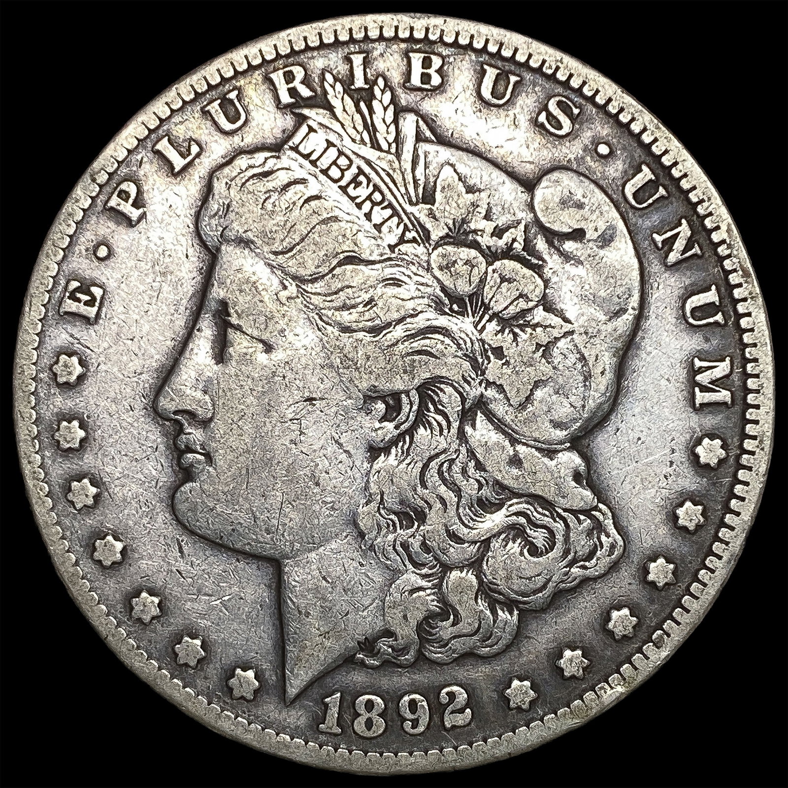 1892-CC Silver Morgan Dollar ABOUT UNCIRCULATED: 1892-CC Silver Morgan Dollar ABOUT UNCIRCULATED