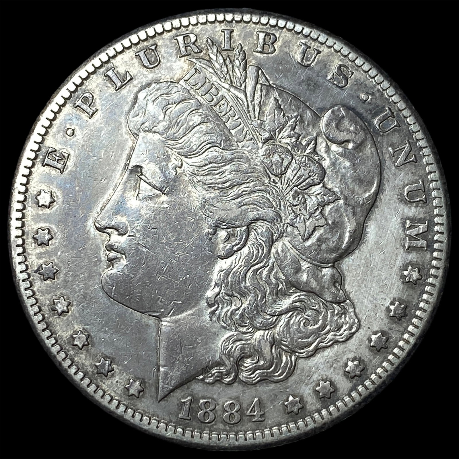 1884-O Silver Morgan Dollar CLOSELY UNCIRCULATED (1 of 2)