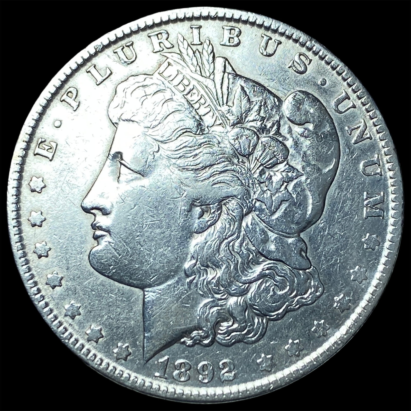 1892-O Morgan Silver Dollar CLOSELY UNCIRCULATED: 1892-O Morgan Silver Dollar CLOSELY UNCIRCULATED
