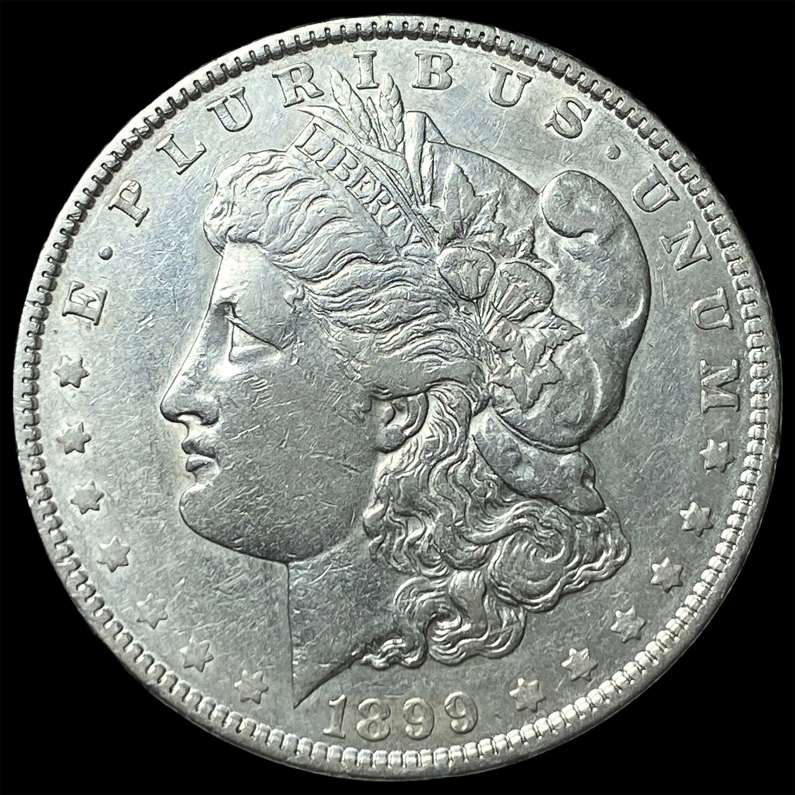 1899 Morgan Silver Dollar CLOSELY UNCIRCULATED: 1899 Morgan Silver Dollar CLOSELY UNCIRCULATED
