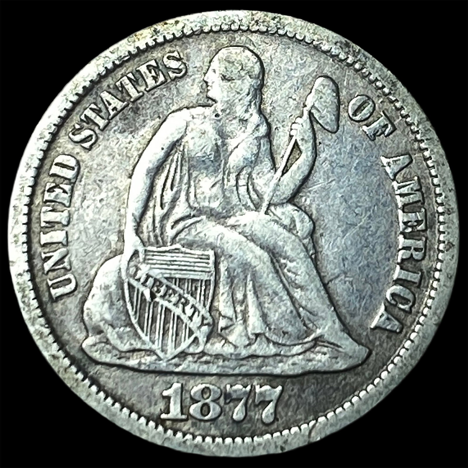 1877-CC Silver Seated Liberty Dime NEARLY UNCIRCULATED: 1877-CC Silver Seated Liberty Dime NEARLY UNCIRCULATED