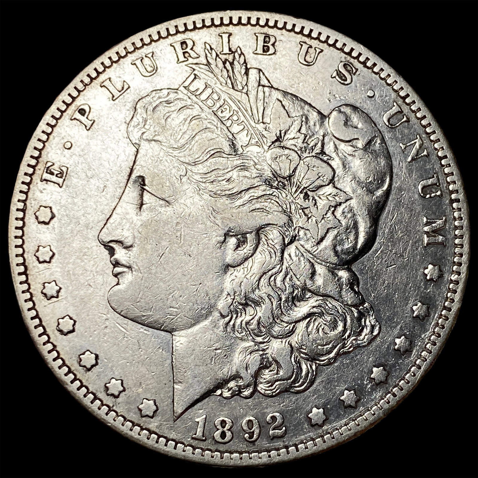 1892-S Silver Morgan Dollar ABOUT UNCIRCULATED: 1892-S Silver Morgan Dollar ABOUT UNCIRCULATED