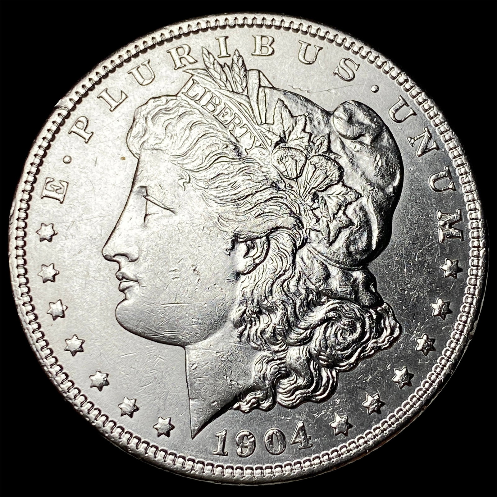 1904 Silver Morgan Dollar CLOSELY UNCIRCULATED (1 of 2)
