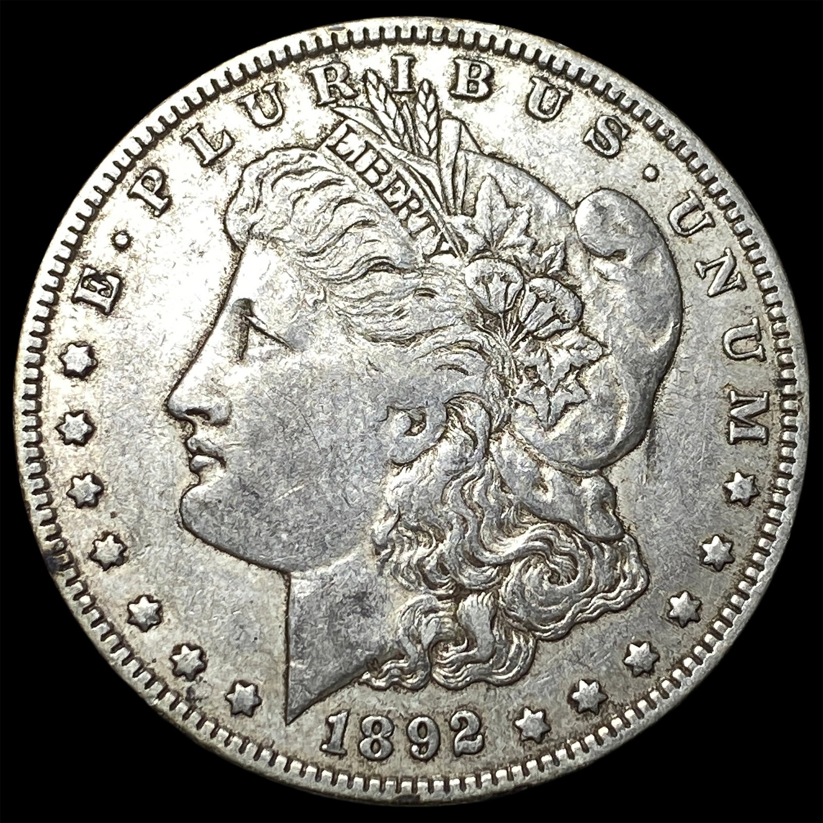 1892-O Morgan Silver Dollar NEARLY UNCIRCULATED: 1892-O Morgan Silver Dollar NEARLY UNCIRCULATED