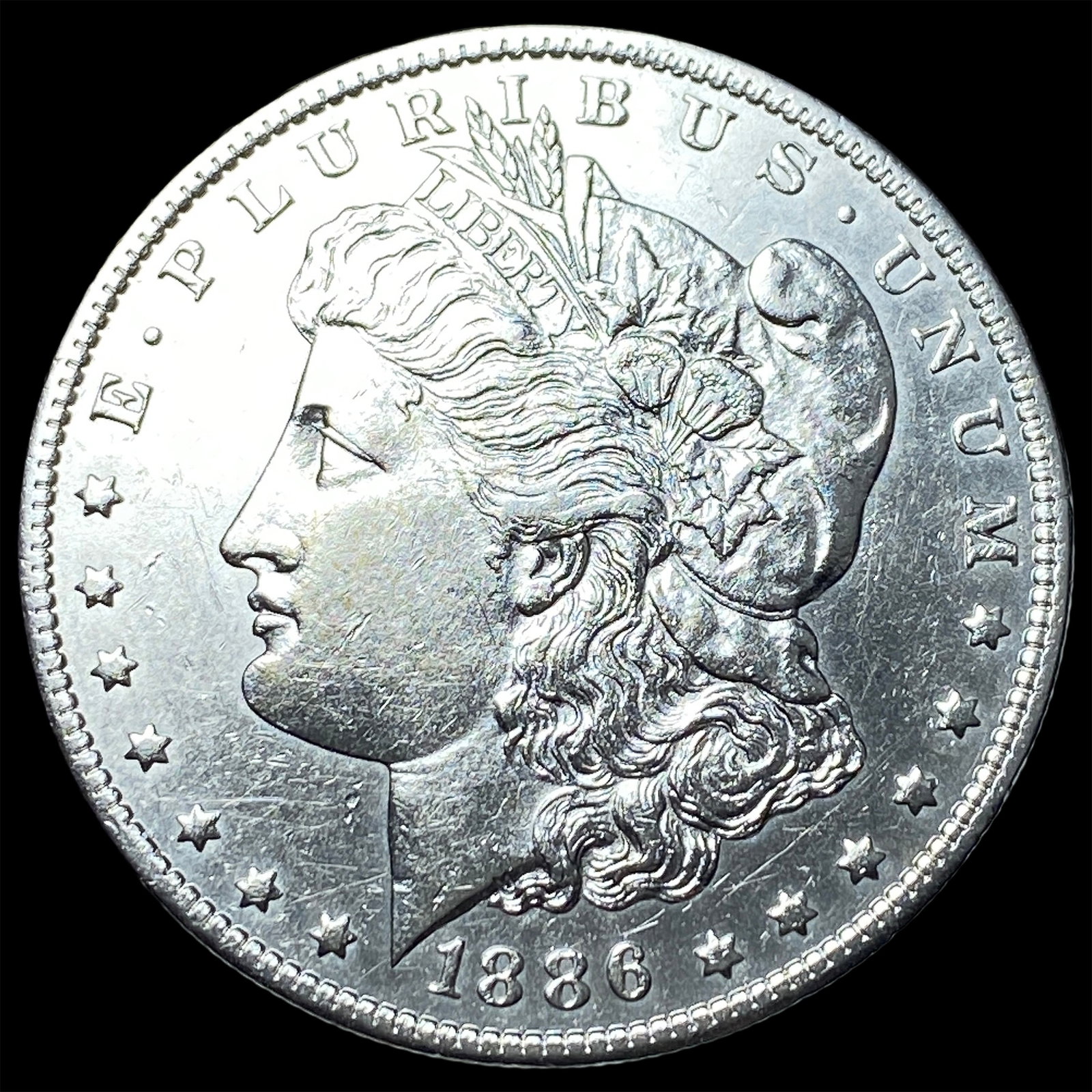 1886 Silver Morgan Dollar CLOSELY UNCIRCULATED (1 of 2)