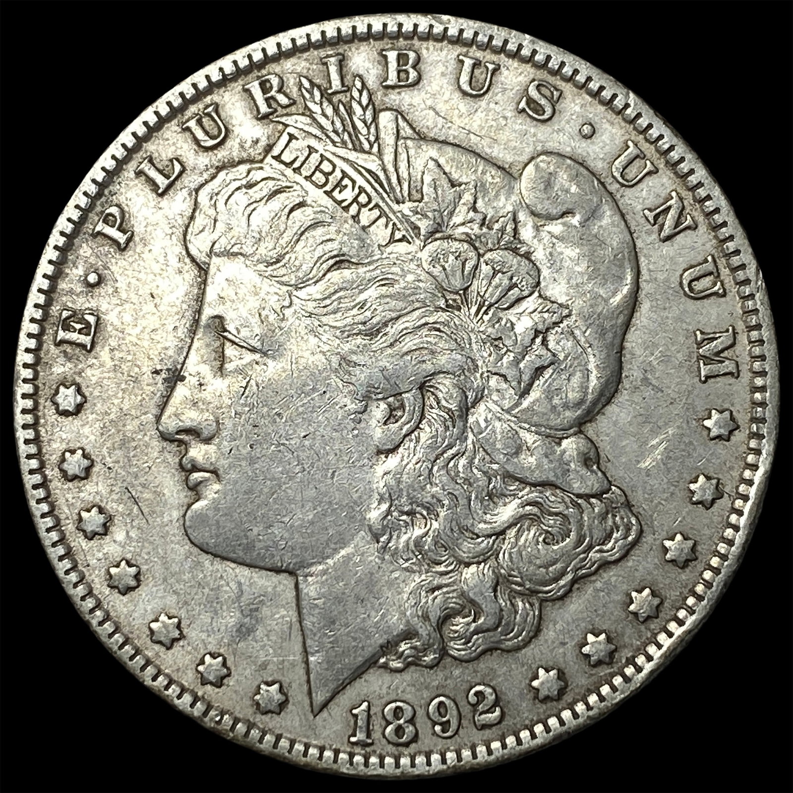1892-O Silver Morgan Dollar NEARLY UNCIRCULATED (1 of 2)